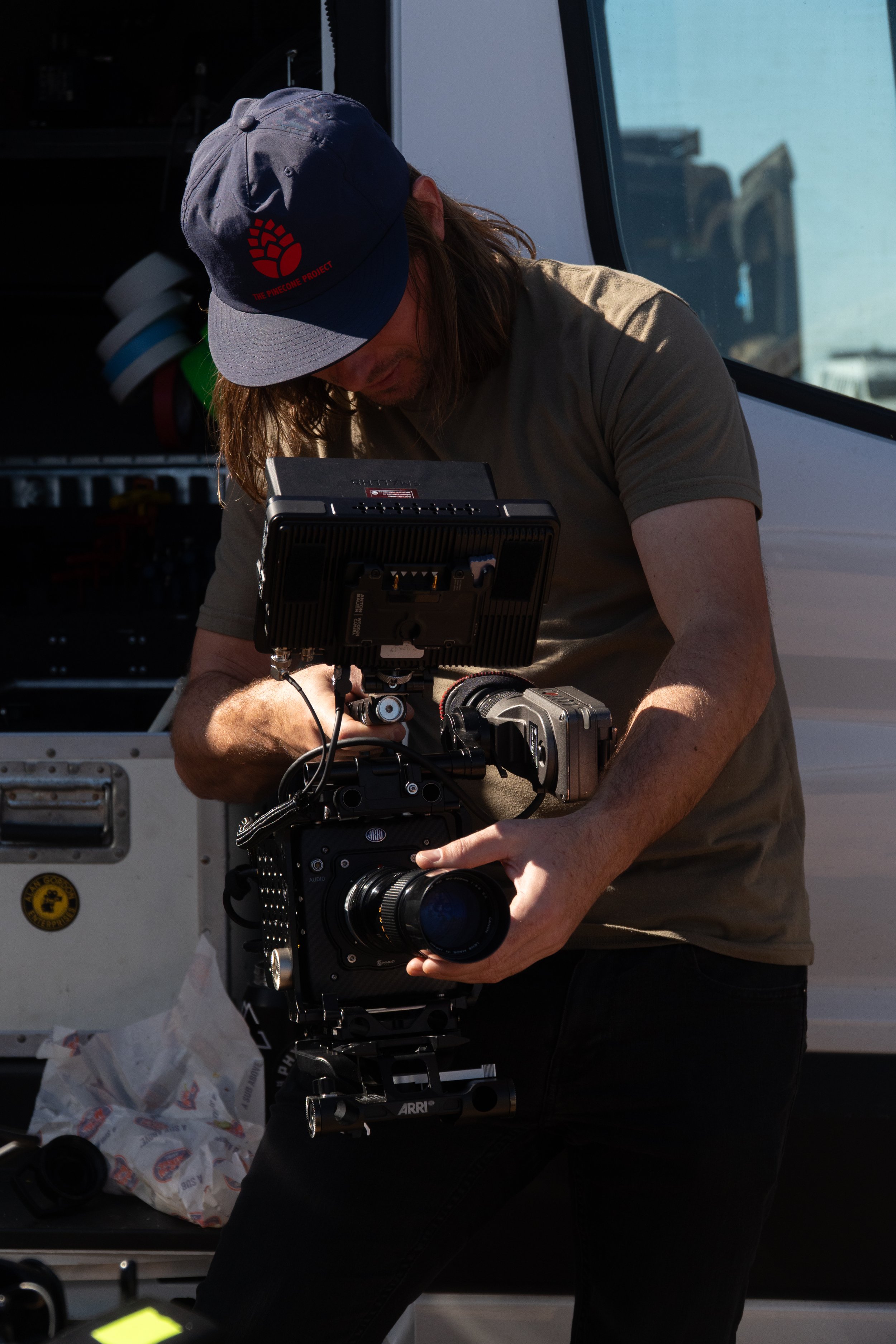 Professional cinema camera rig capturing extreme sports stunt competition