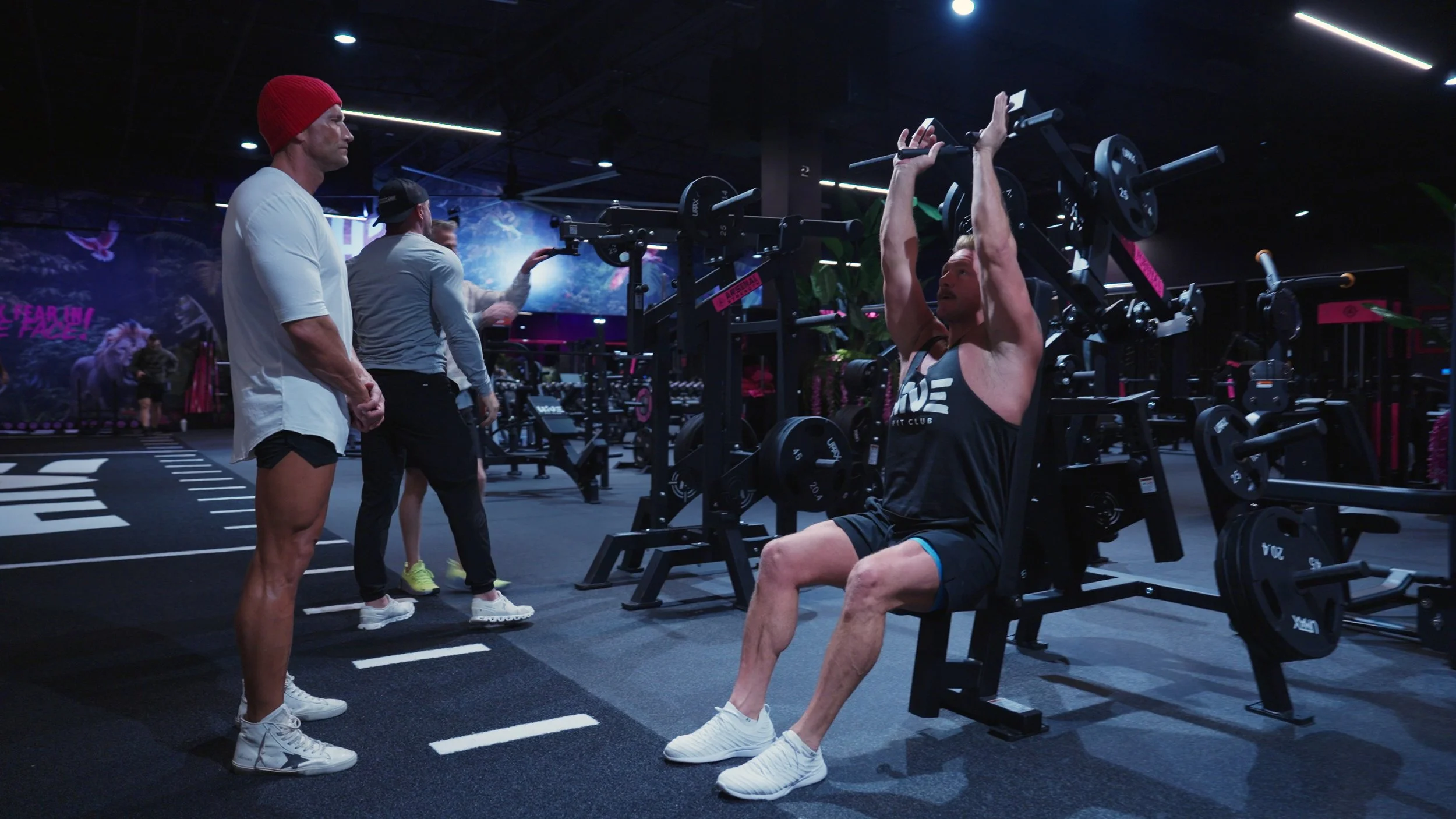 A frame from the finished Hive Fit Club branded documentary showing the completed gym on opening day, produced by Ragtown Media.