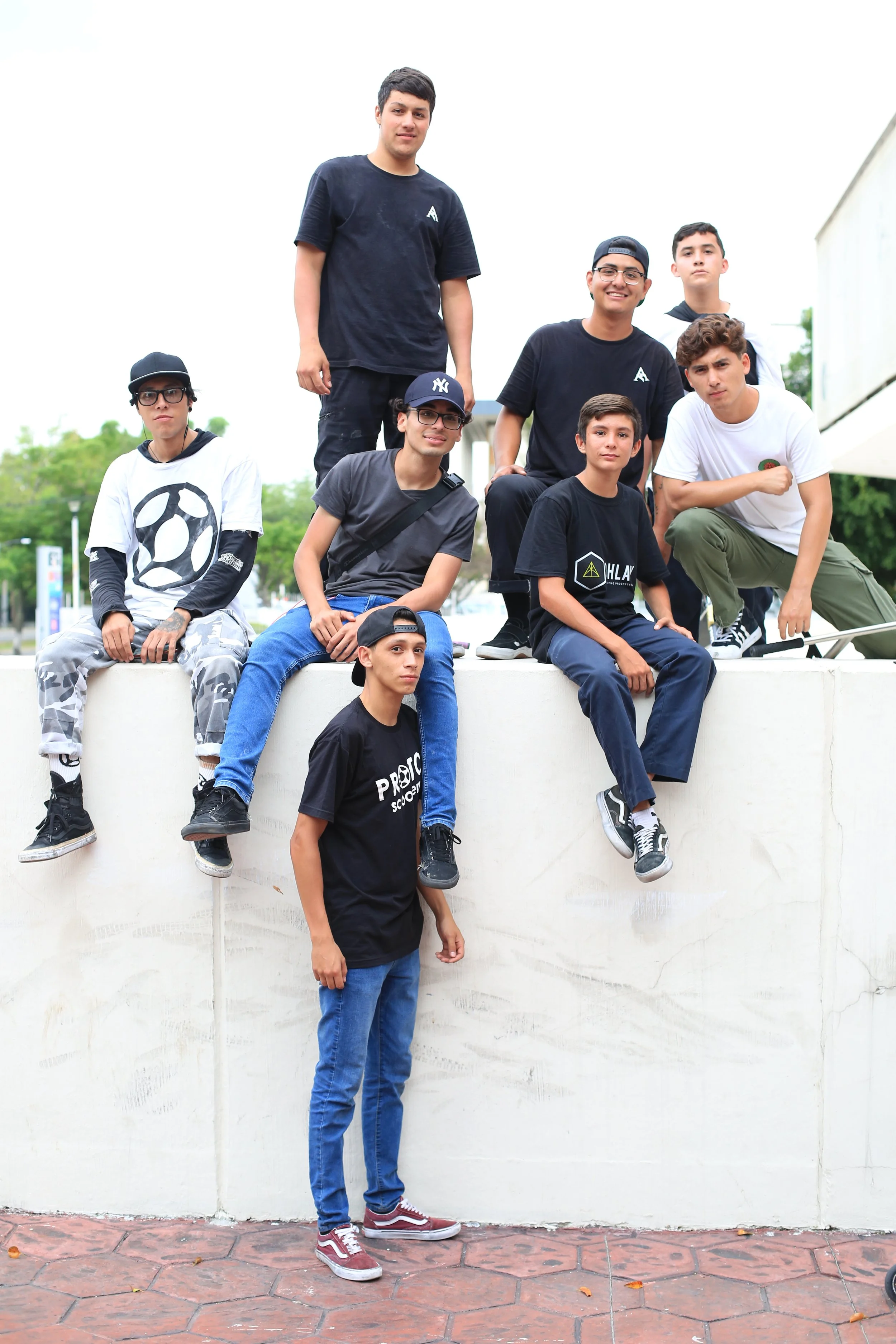Documentary footage of freestyle scooter riders posing together during the TV Gram event in Guadalajara Mexico
