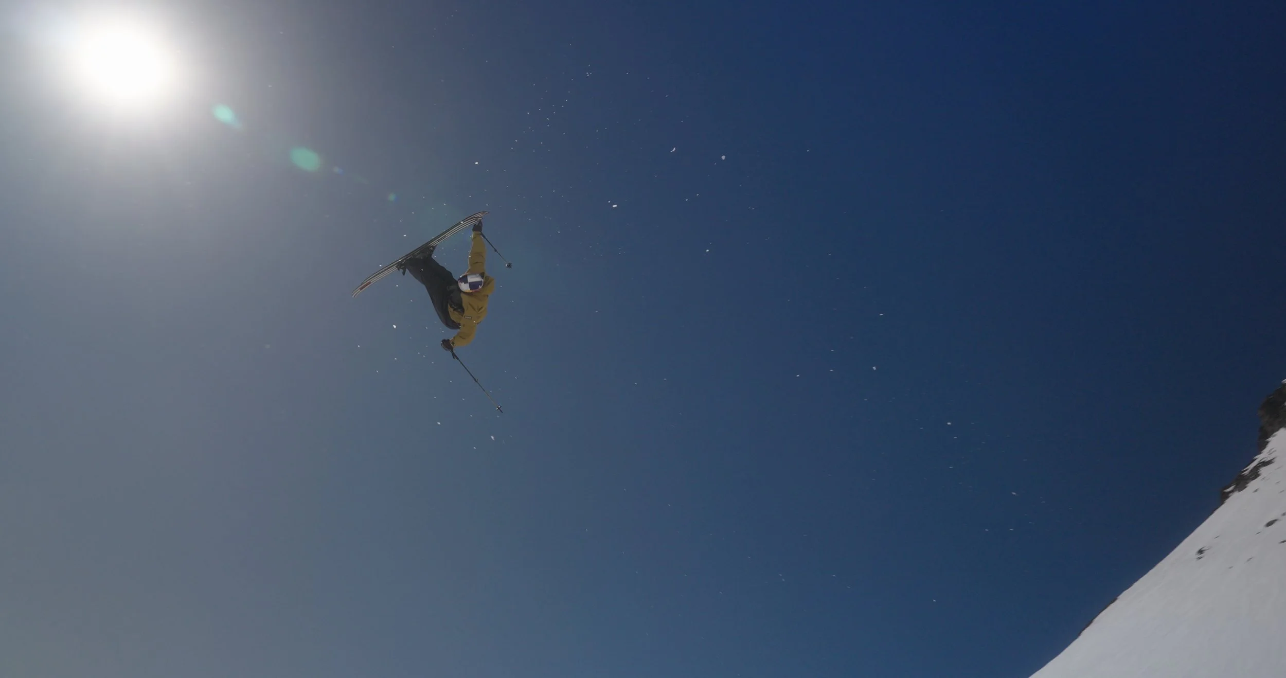 Professional skier performing an aerial trick at Swatch Nines filmed by Ragtown Media in Austria