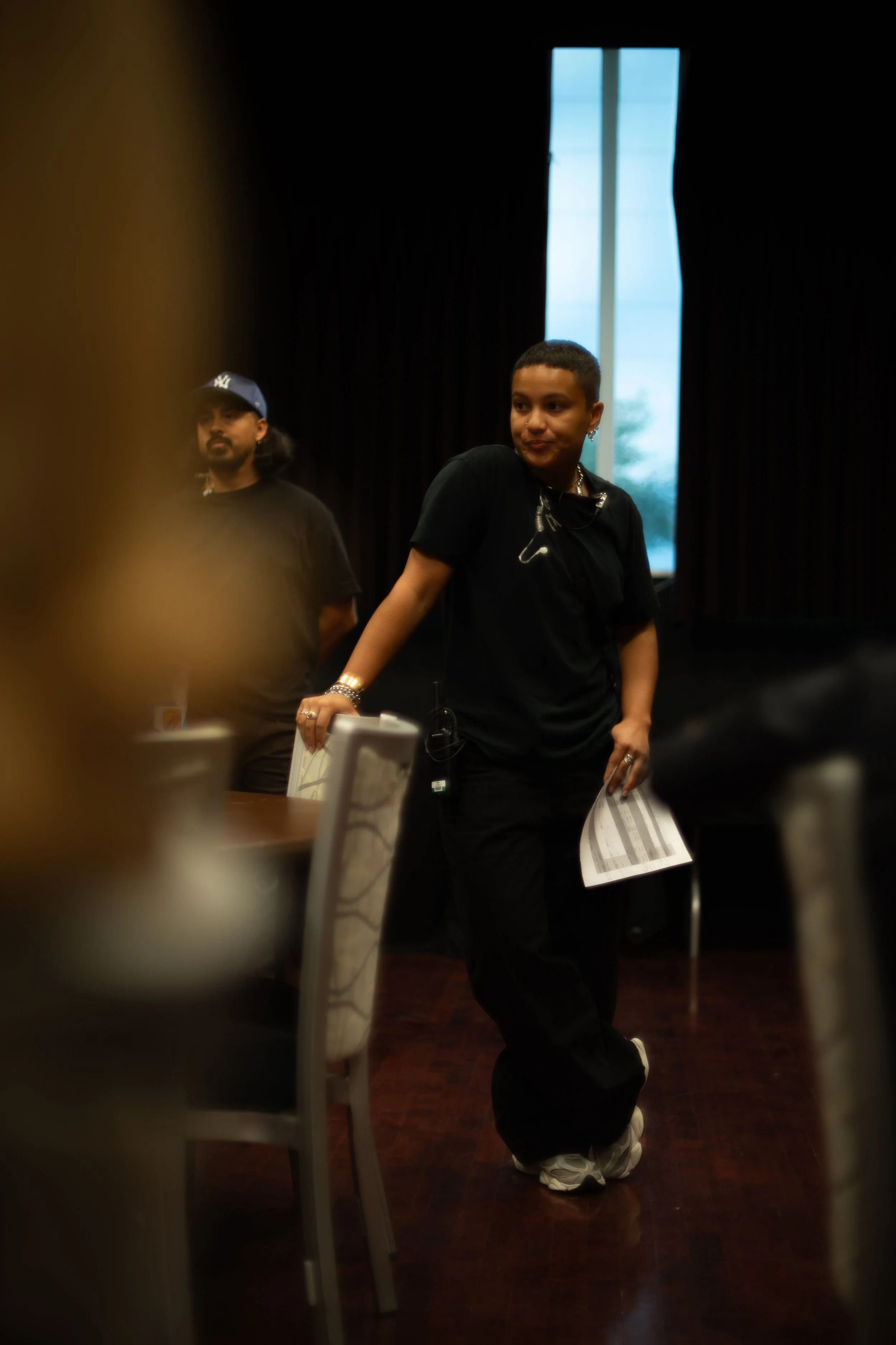 Live event production crew coordinating rehearsals inside the Orpheum Theatre before the MC Magic performance