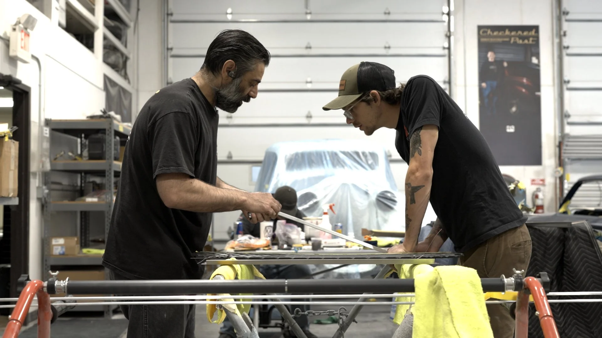 CAL Auto Creations technicians assembling custom performance components inside their Nebraska fabrication shop.