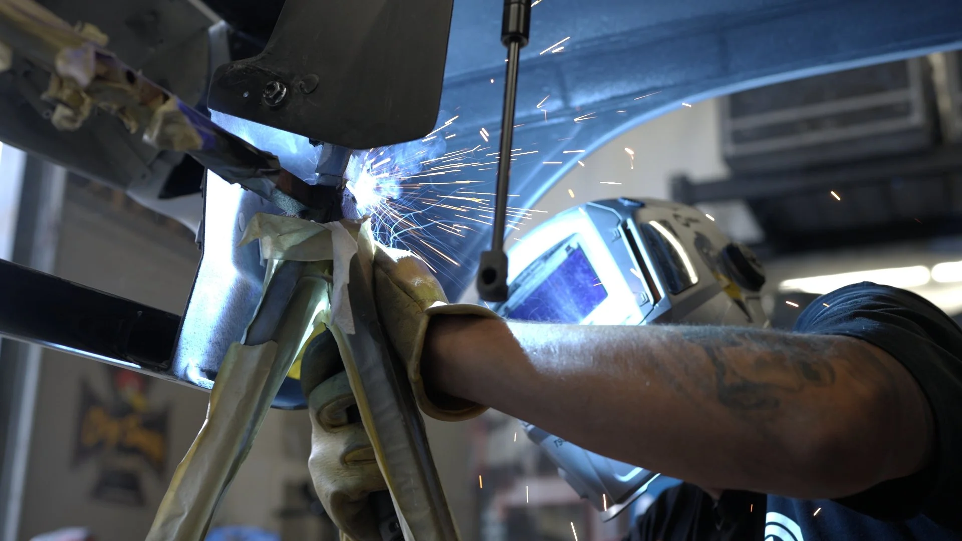 Precision TIG welding on custom automotive frame by Streamline fabricator during Barrett-Jackson Cup competition build