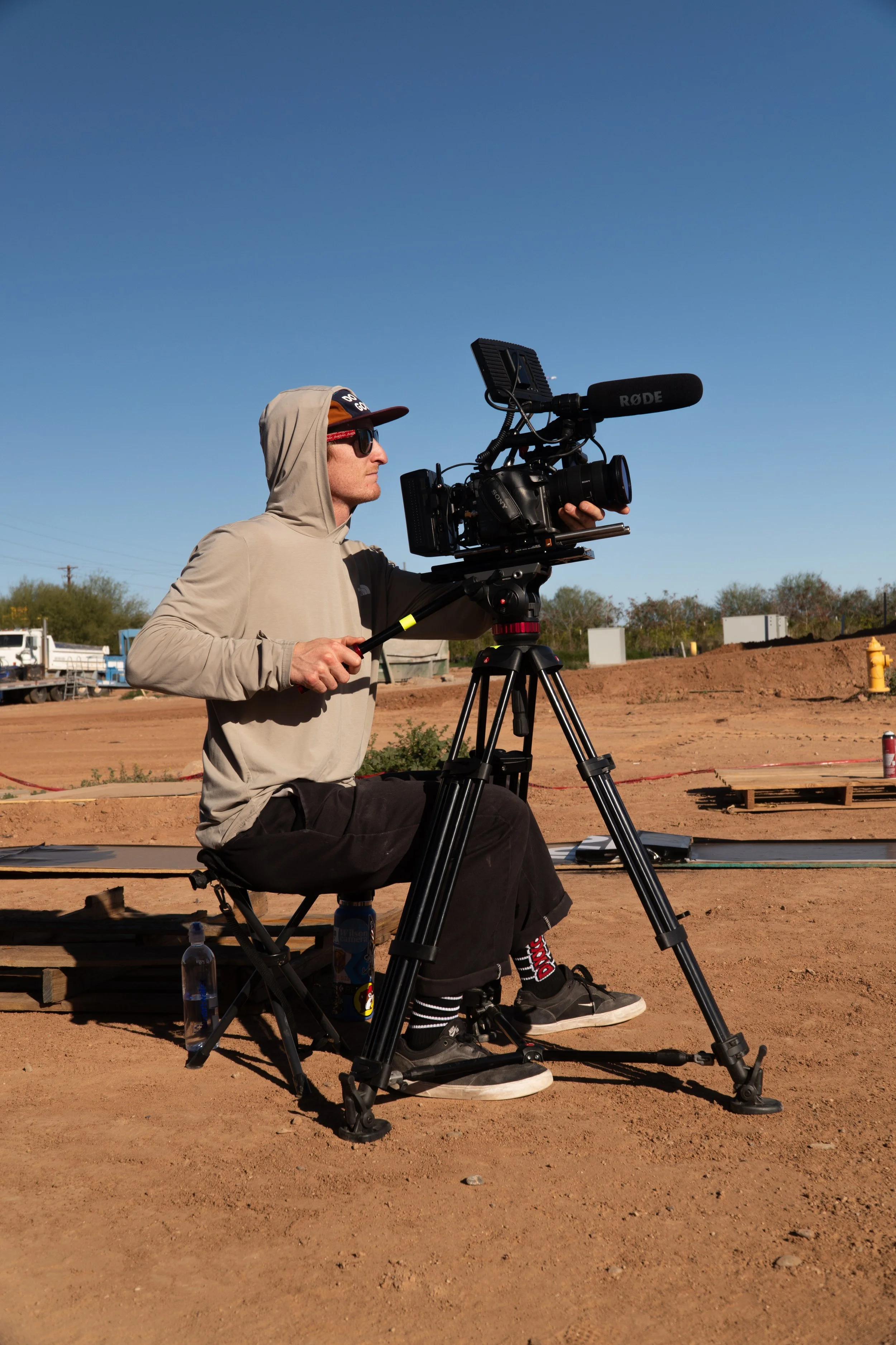 Cinematographer filming extreme sports event using Sony FX6 camera