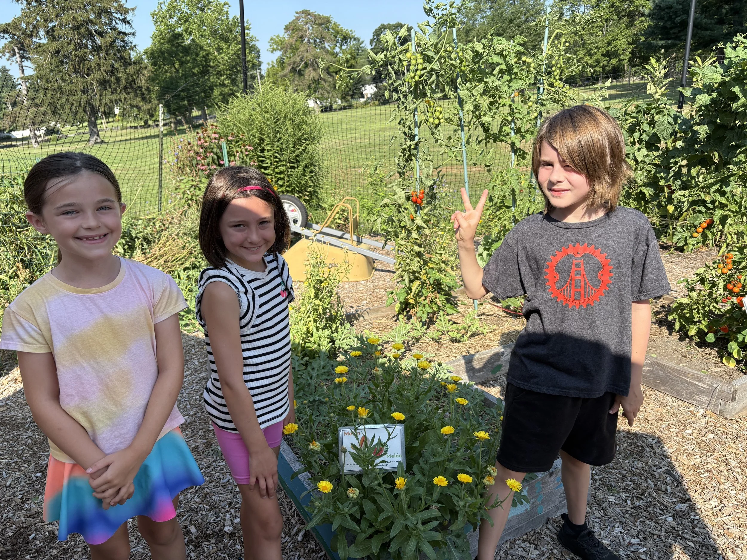 smiles in the garden summer camp 2025.jpg