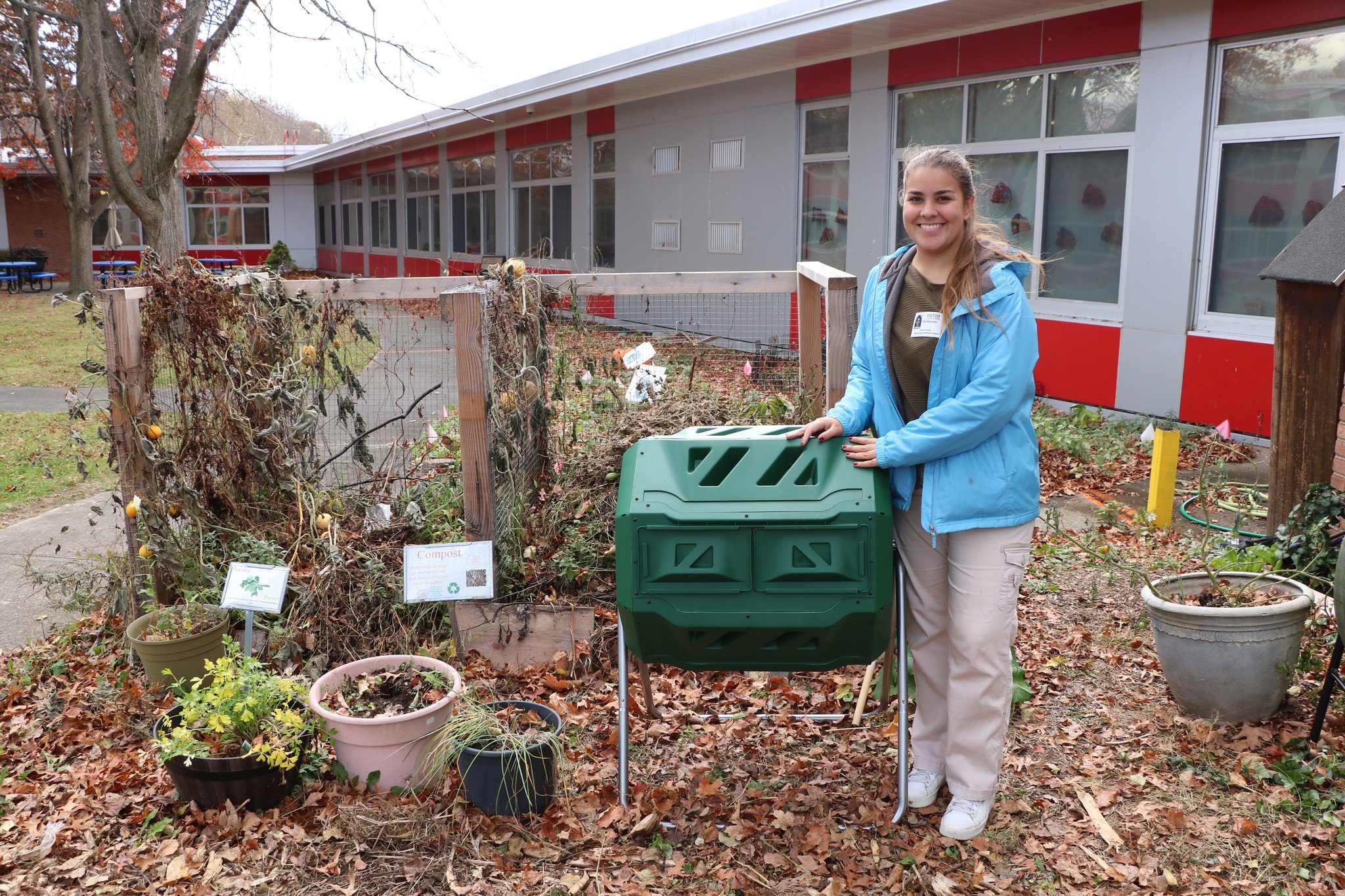 At Gidney Avenue Memorial School in Newburgh, Gardener Thea built a new compost barrel for the garden which will replace the compost pile behind her, and keep the garden neat and tidy. After tasting food from the garden, children can put their uneate