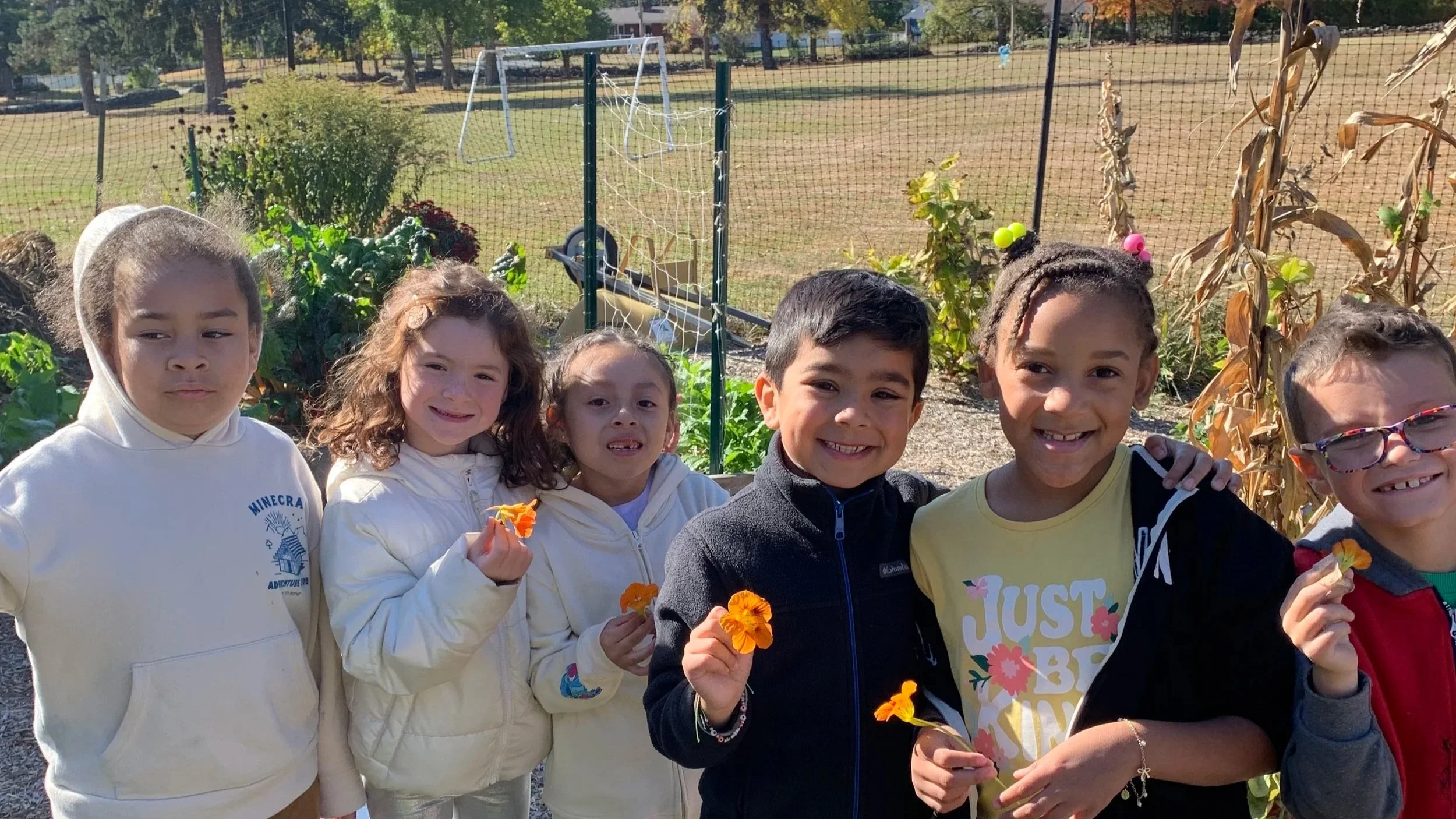 '24-'25 Sargent 2nd graders with flowers.jpg