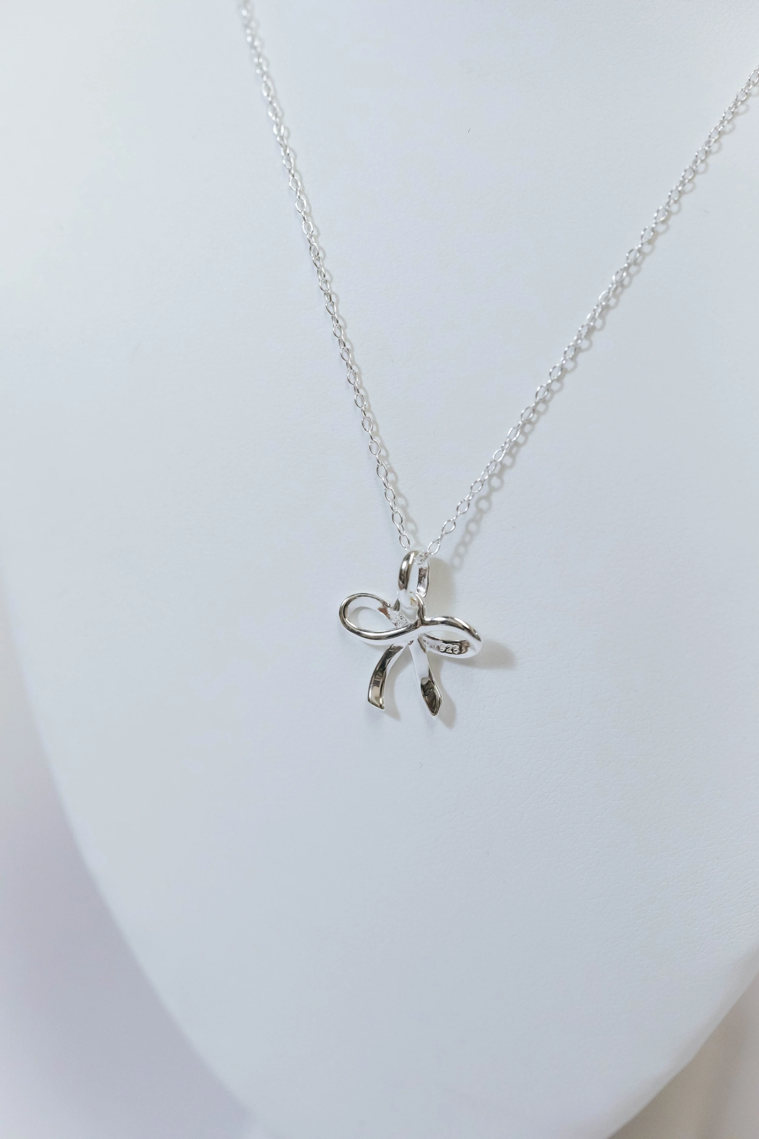 chain 372 68793 1mm cable chain $49 , bow pend 372 68863 .01CT diam $88-2.jpg