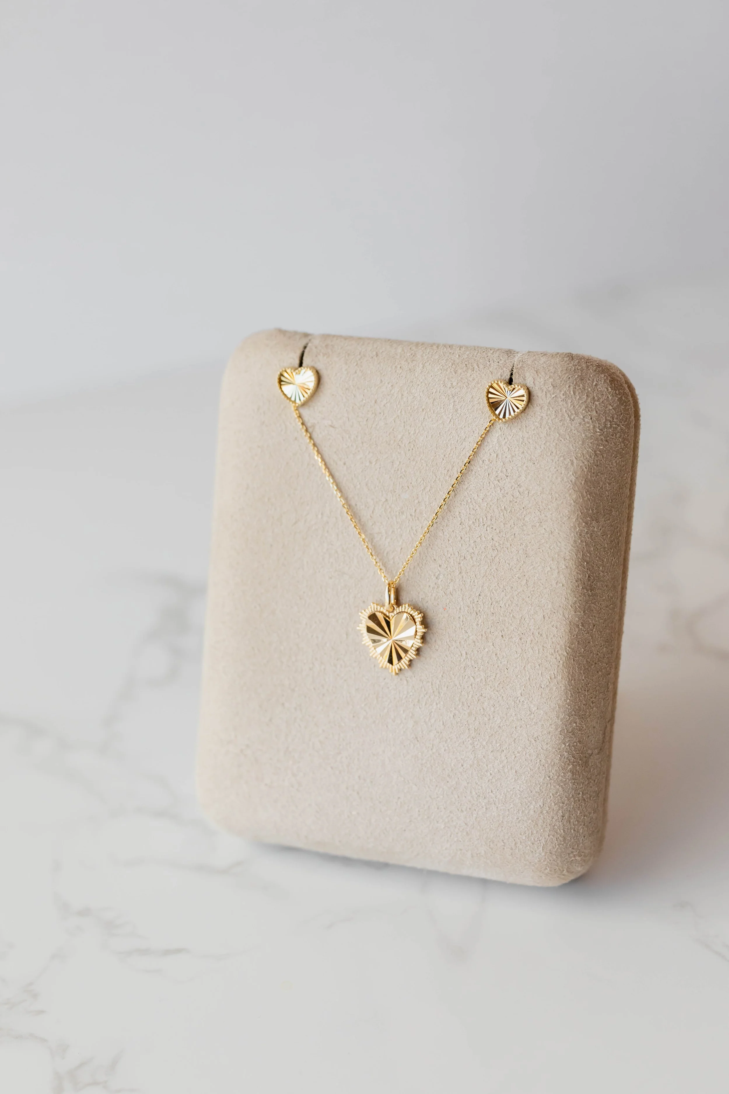 267 902 $335 heart neck, 60 7245 $145 heart ear-1.jpg