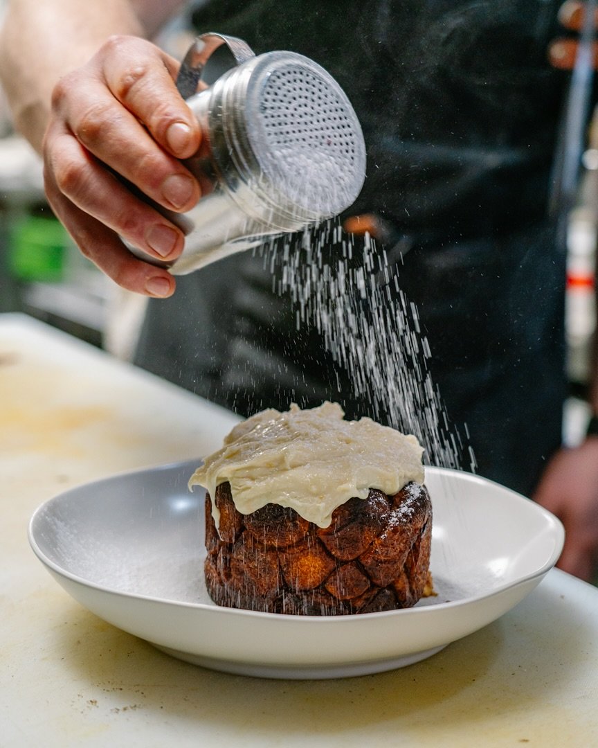 Say hello to our Monkey Bread! A deliciously creative way to give leftover burger buns a second life. 

We deep-fry them, coat them in orange, cinnamon, fromage blanc icing, and top it all off with a generous dusting of powdered sugar.

This fan favo