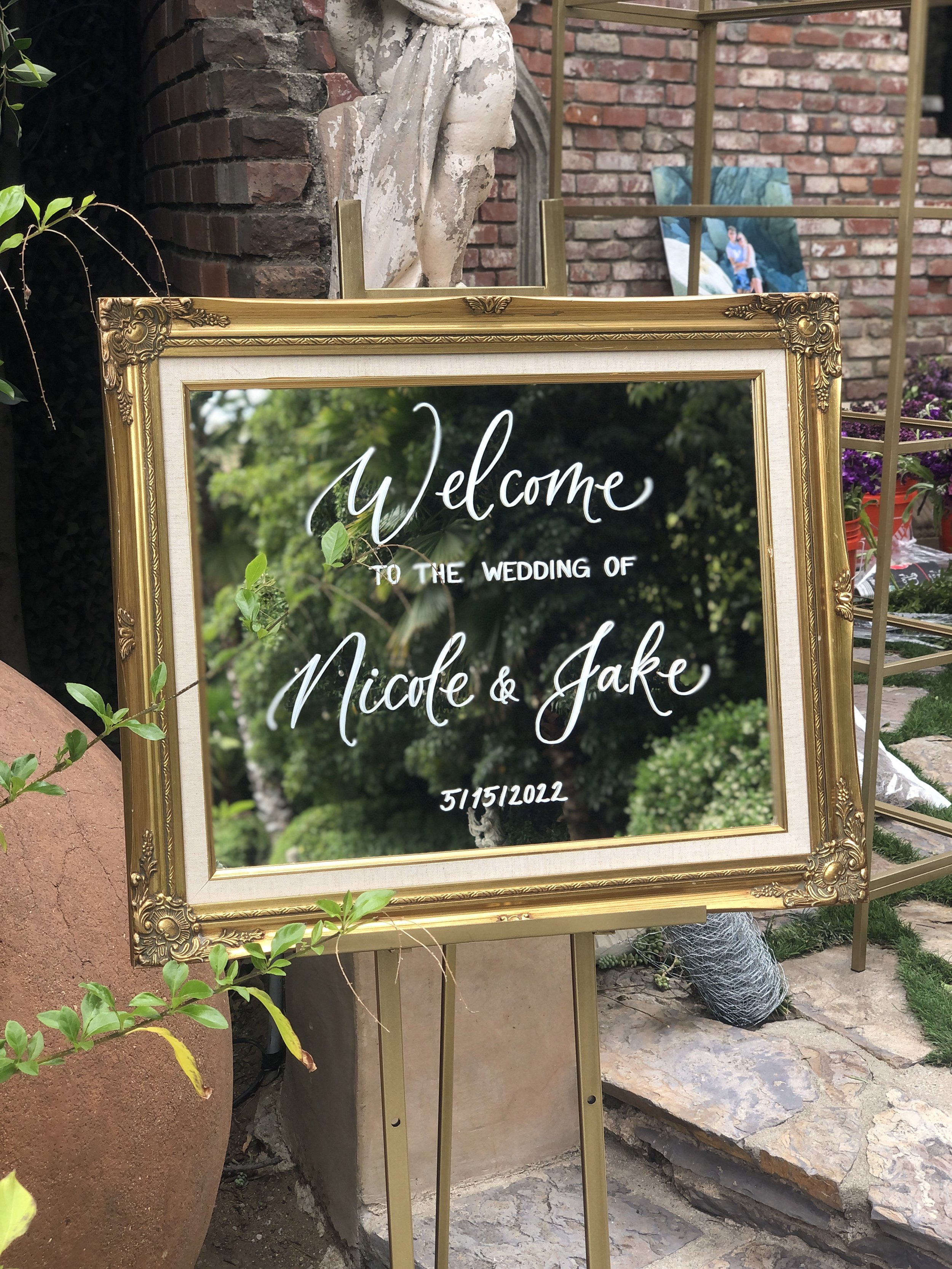 custom calligraphy mirror welcome sign for wedding in los angeles.jpg