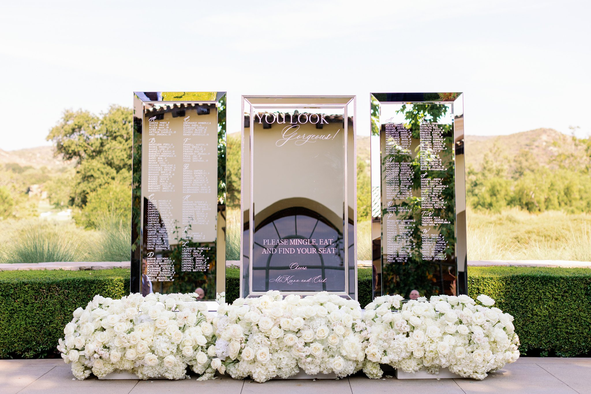 large silver wedding mirror seating chart with selfie mirror in los angeles.jpg