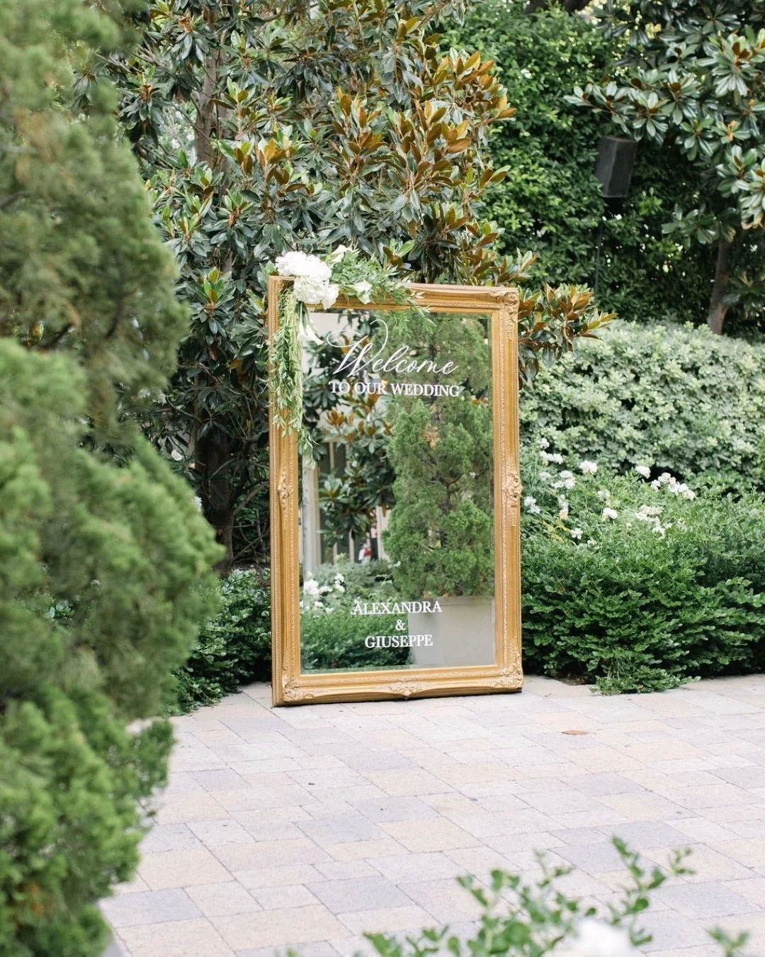 A full-length mirror welcome sign is one of my favorite ways to use our larger mirror rentals, because our large mirrors aren&rsquo;t just for seating charts - They work just as well as statement welcome signs, greeting guests as soon as they arrive 