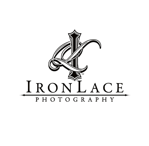 Logo for Iron Lace Photography featuring a decorative sword entwined with a lace-like ribbon.