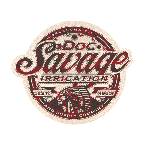 A circular logo with the text "DOC Savage" in large cursive and serif fonts, with additional text "Oklahoma City" at the top, "Irrigation and Supply Company" at the bottom, "Est 1960," and a graphic of a Native American warrior with a spear.