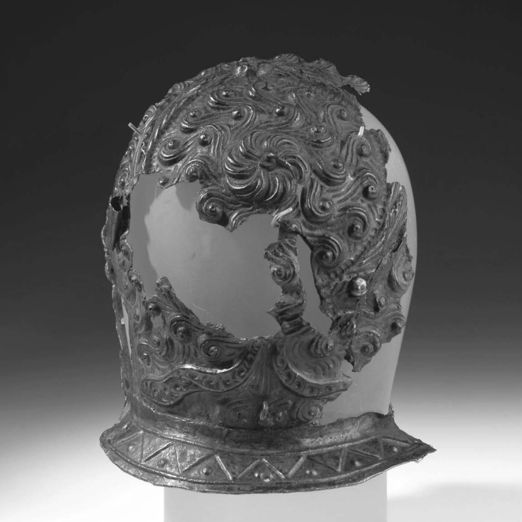 (verso) Newstead Parade Helmet, Ancient Roman, 1st century A.D., Iron, 18 cm high. National Museums of Scotland. (FRA 121)