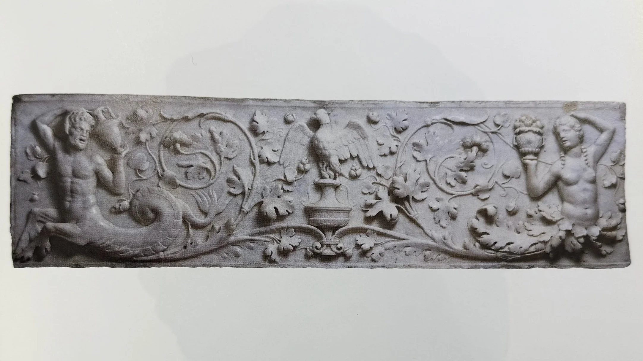 Antonio Lombardo (c.1458 - 1516), Relief with phoenix and two leaved creatures, white carrara marble. Saint Petersburg, Hermitage.