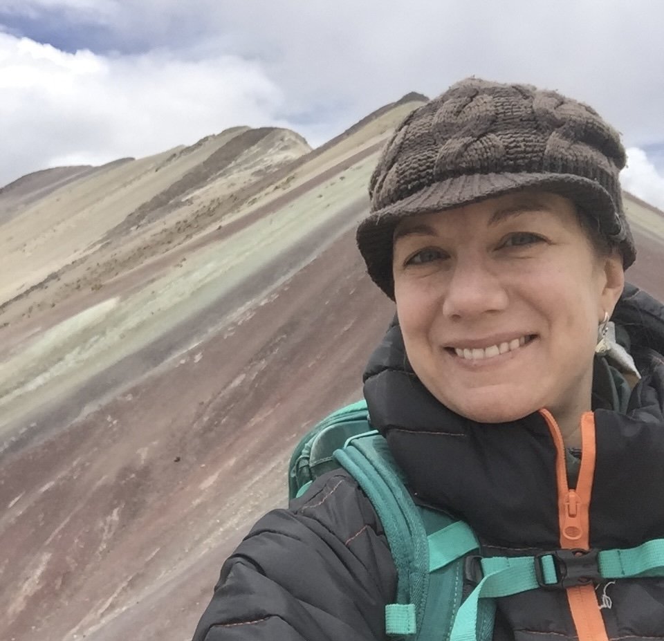 me at Rainbow Mountain in 2019
