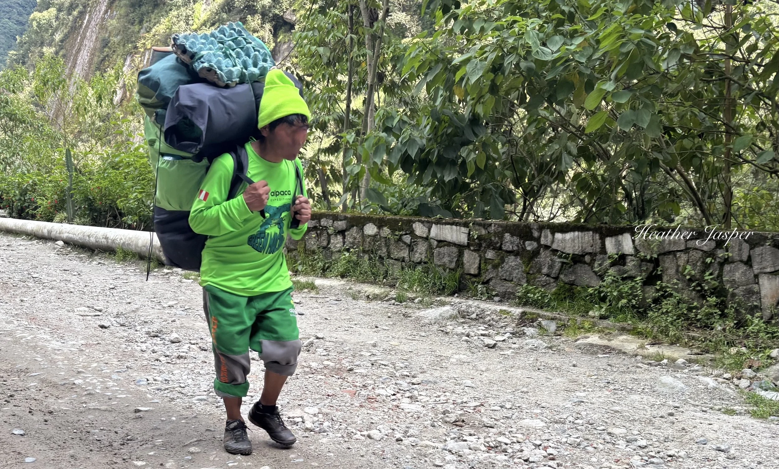 Alpaca Expeditions porter in Aguas Calientes
