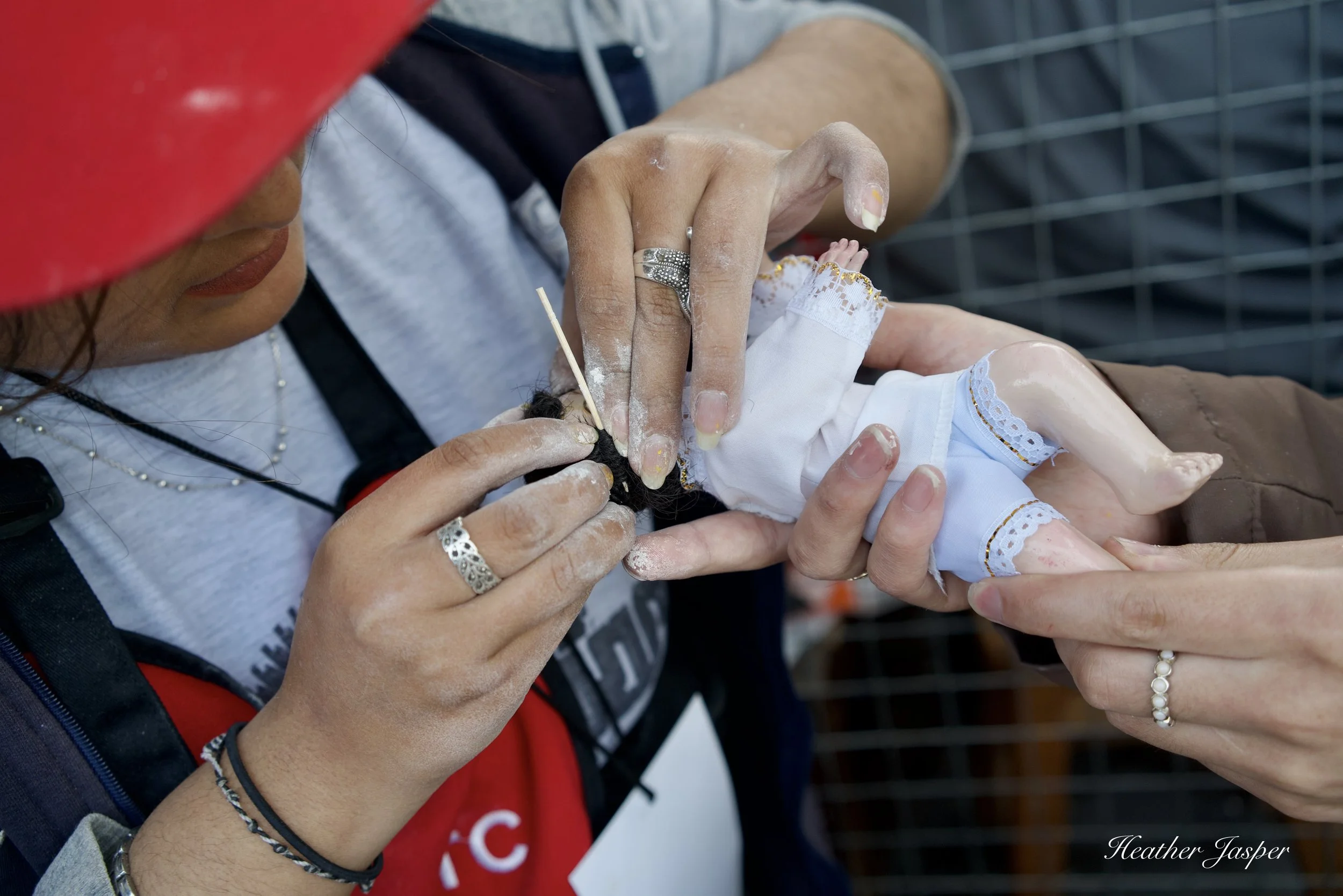 repairing El Niño Manuelito at Santurantikuy Cusco Peru