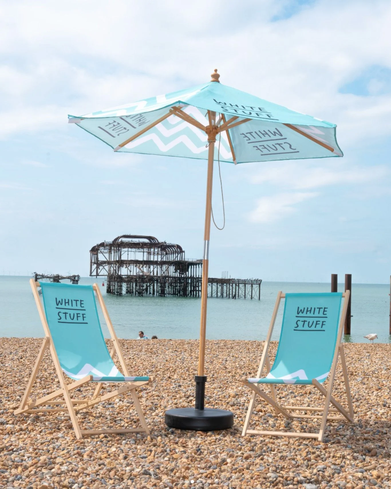 Branded beach chairs and umbrella
