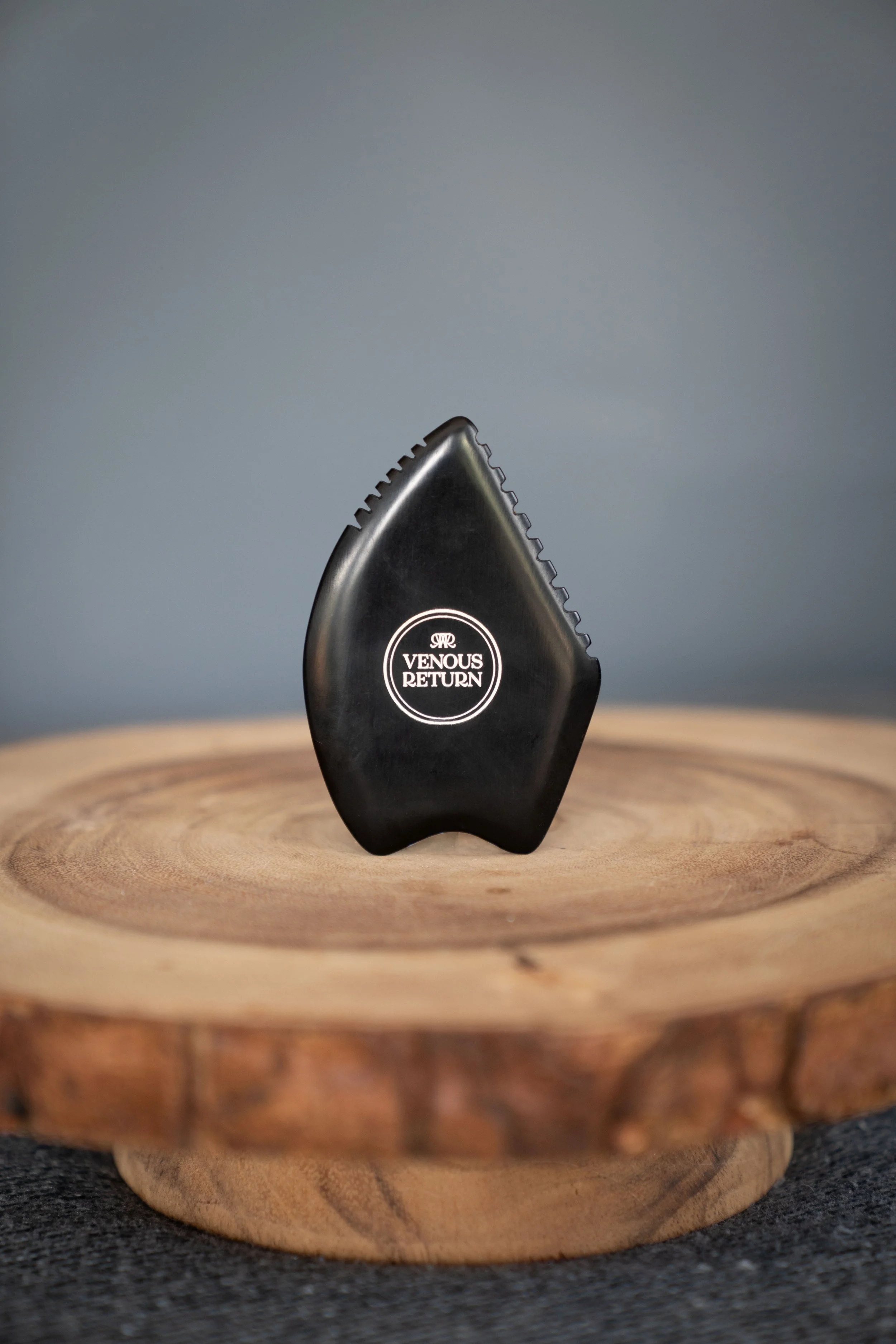 Venous Return Healing's Bian Gua Sha Stone for lymphatic drainage and self massage.