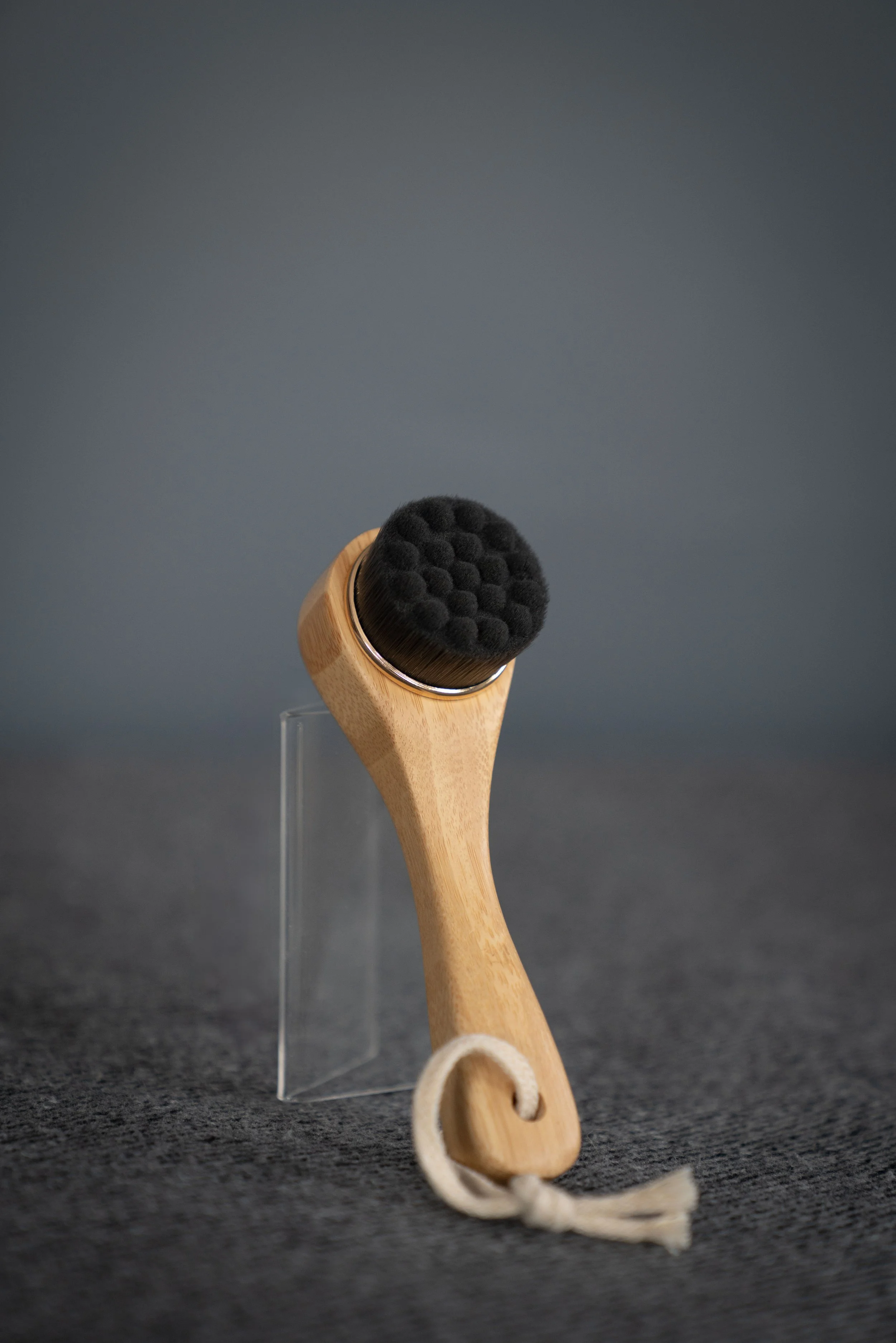 Back of Bamboo Facial Dry Brush for lymphatic drainage self massage.