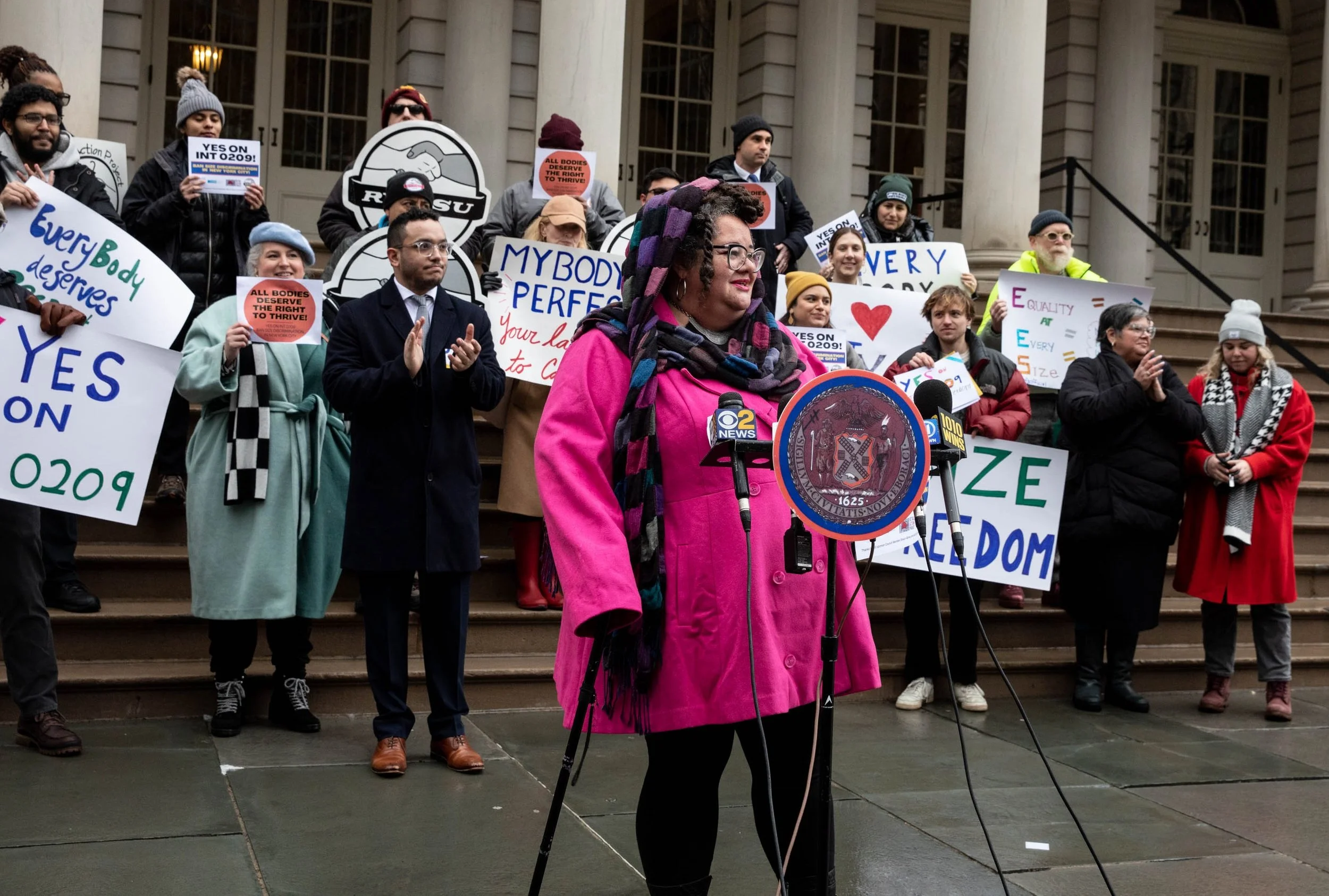 A photo of Tigress speaking at a rally in NYC
