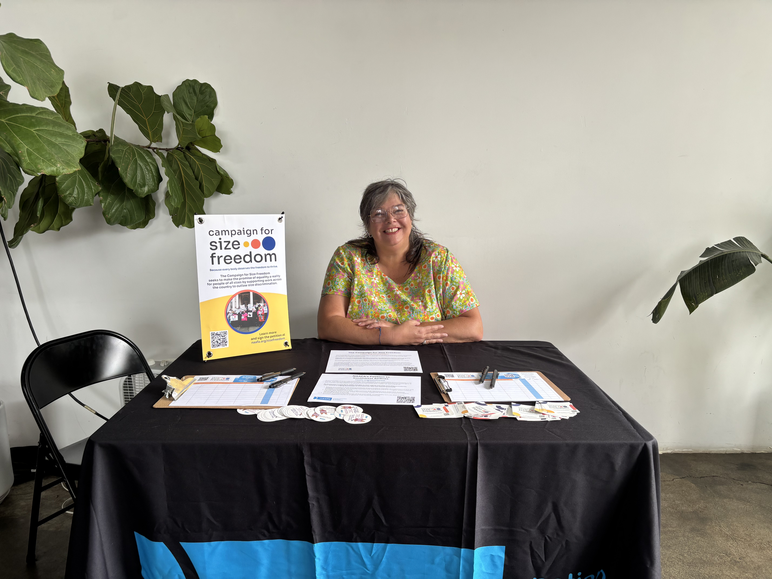 Photo of Amanda Cooper at a NAAFA information table