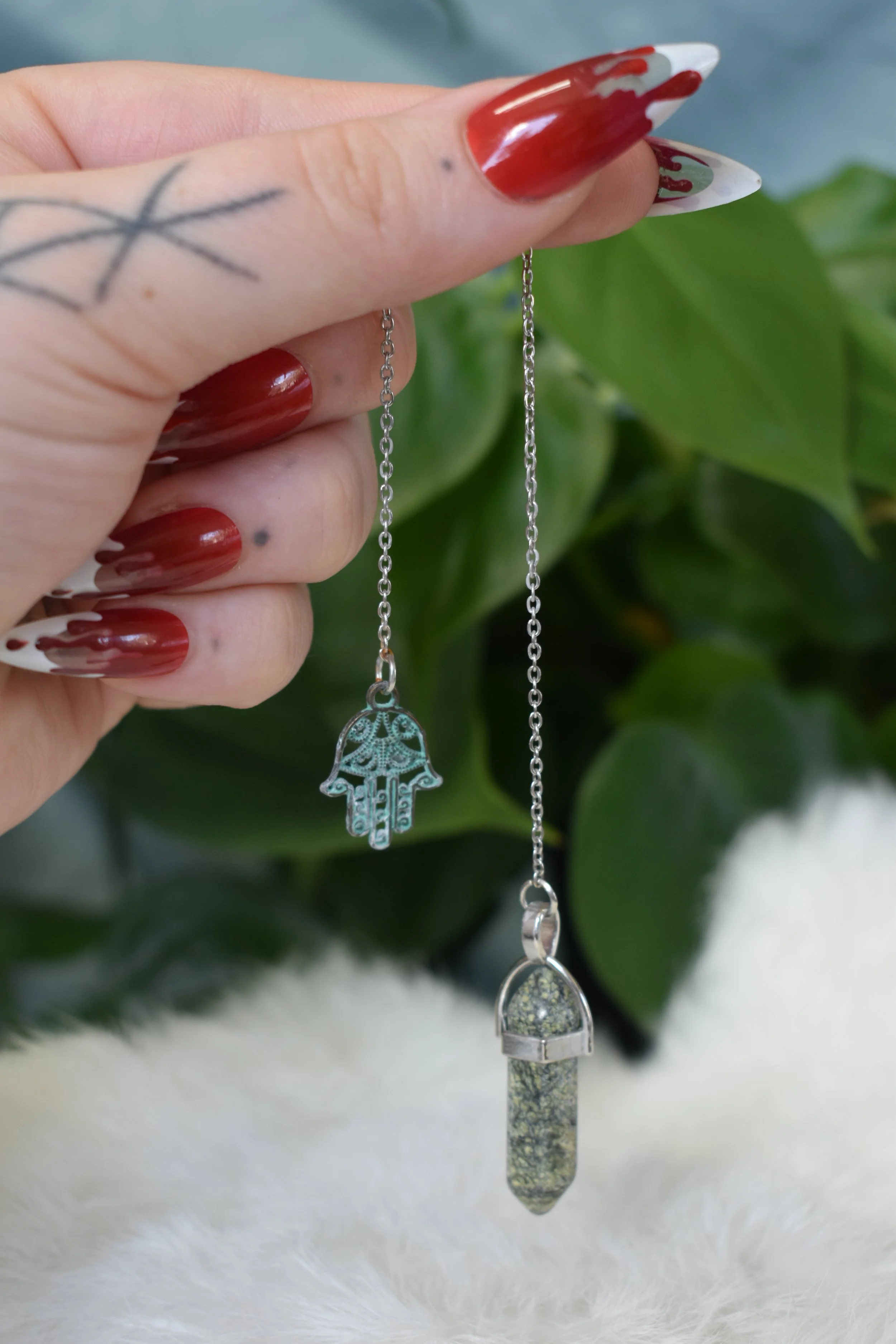 Serpentine and hamsa