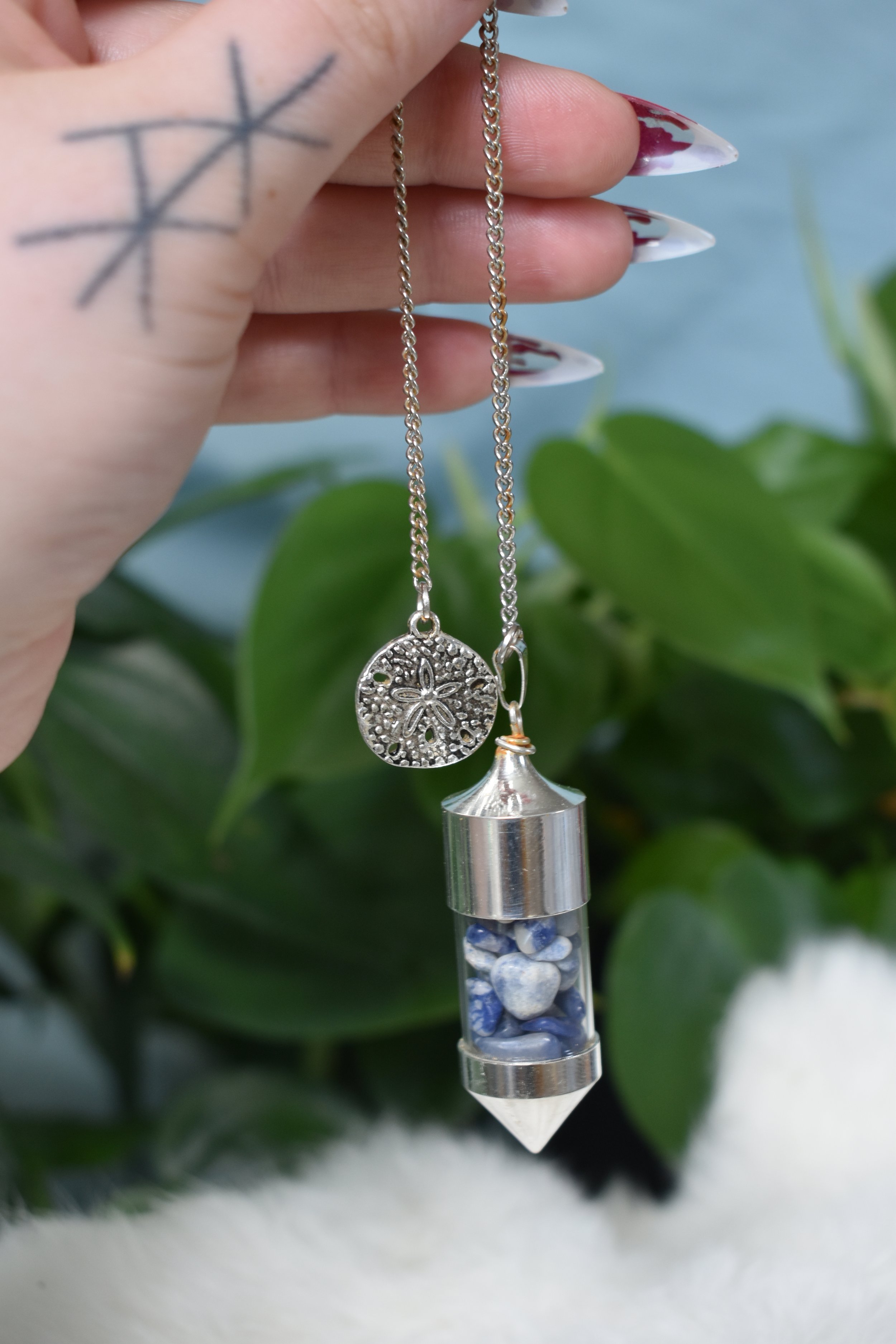 Sodalite and sand dollar