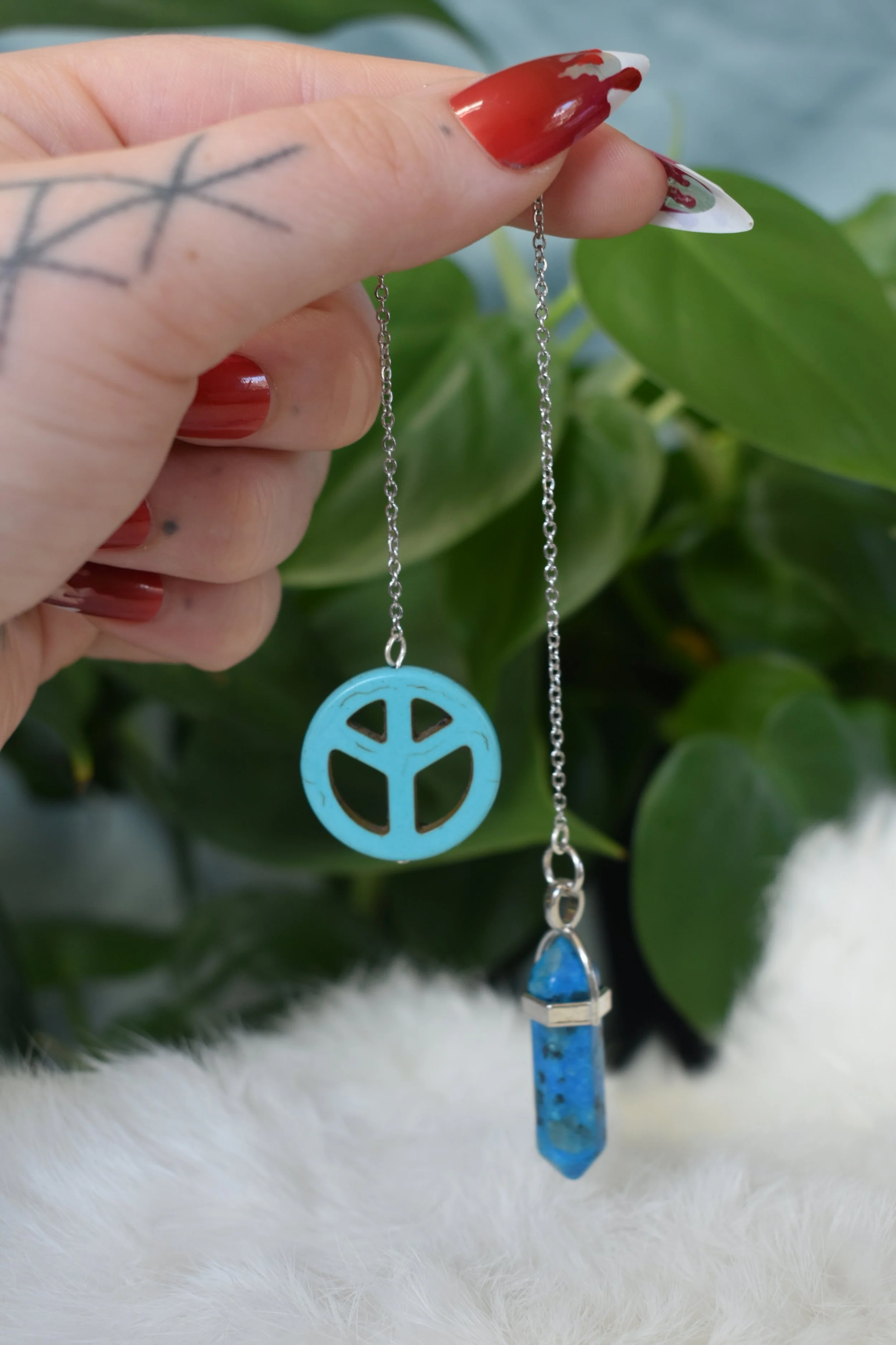 Blue dyed quartz, peace sign
