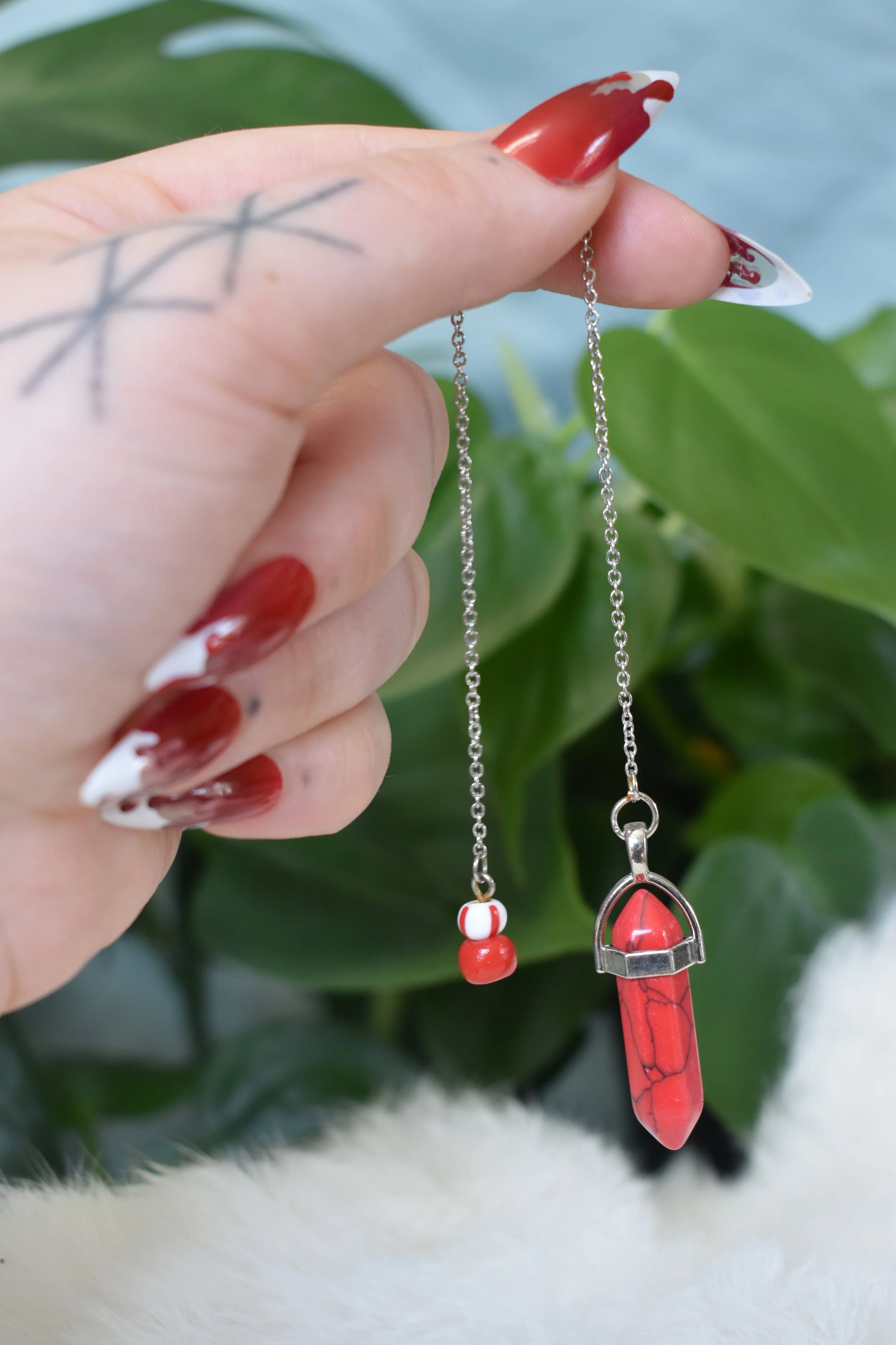 Red dyed howlite with 2 glass beads
