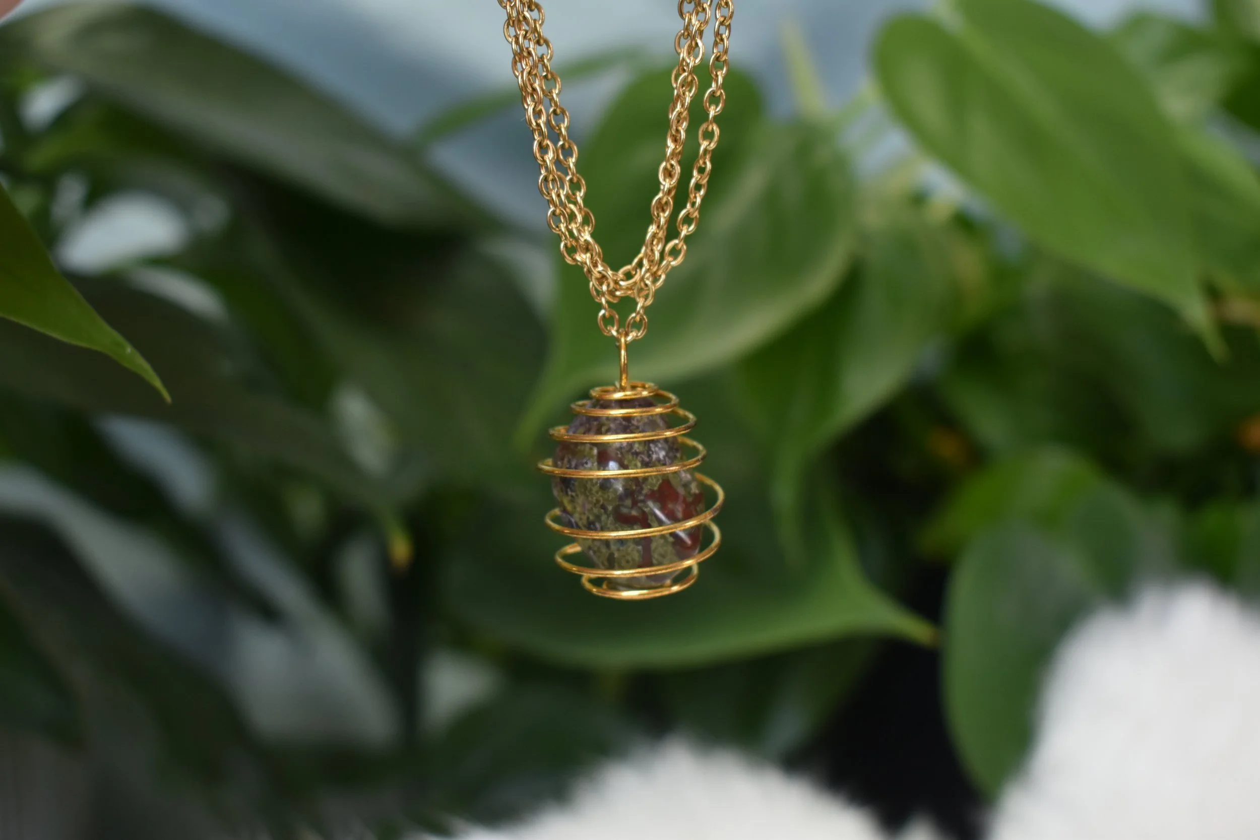 Dragons blood cage necklace