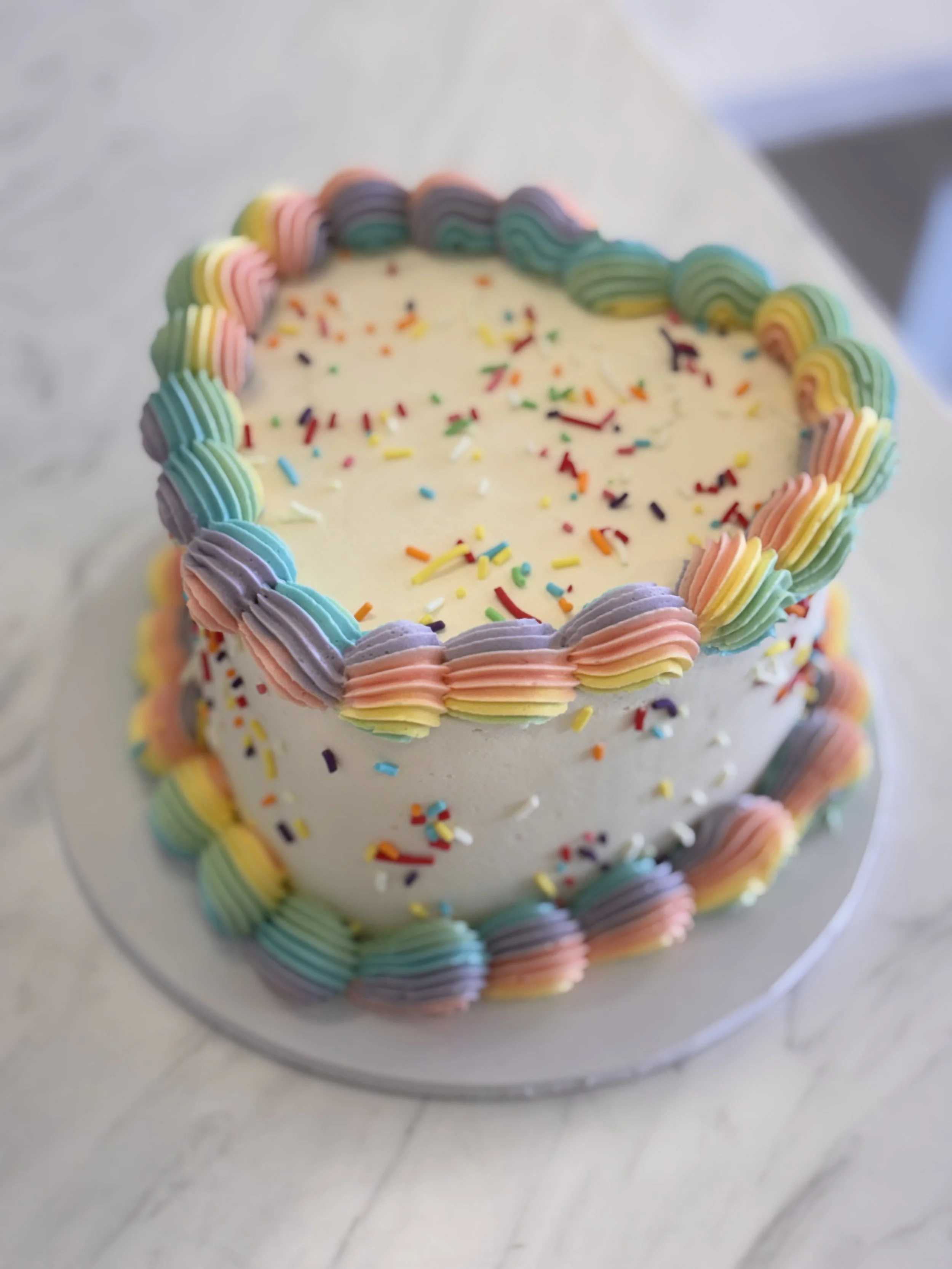 Rainbow Classic Piped Cake.jpg