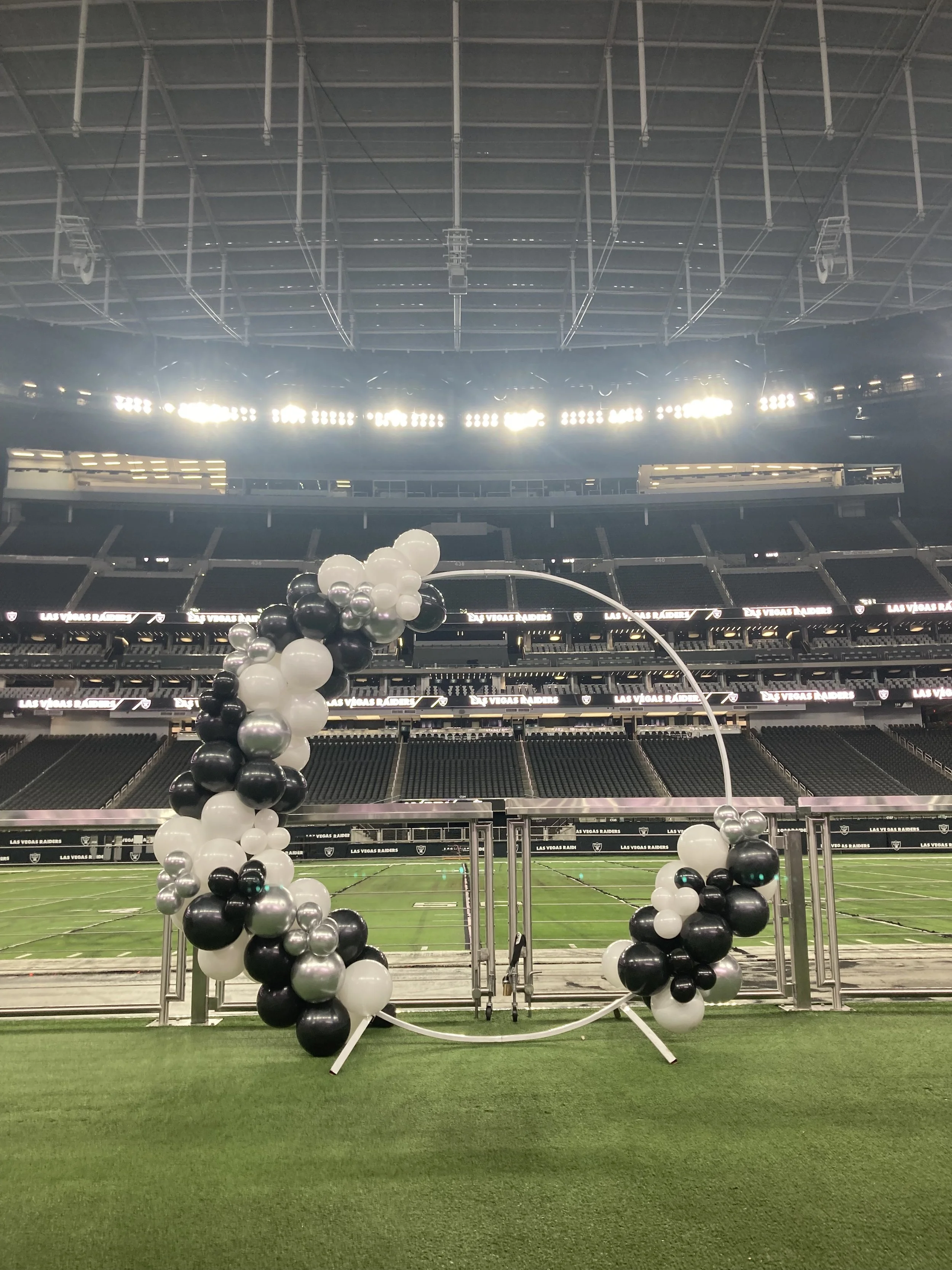 balloon hoop Las Vegas flower walls Las Vegas raiders balloon decor