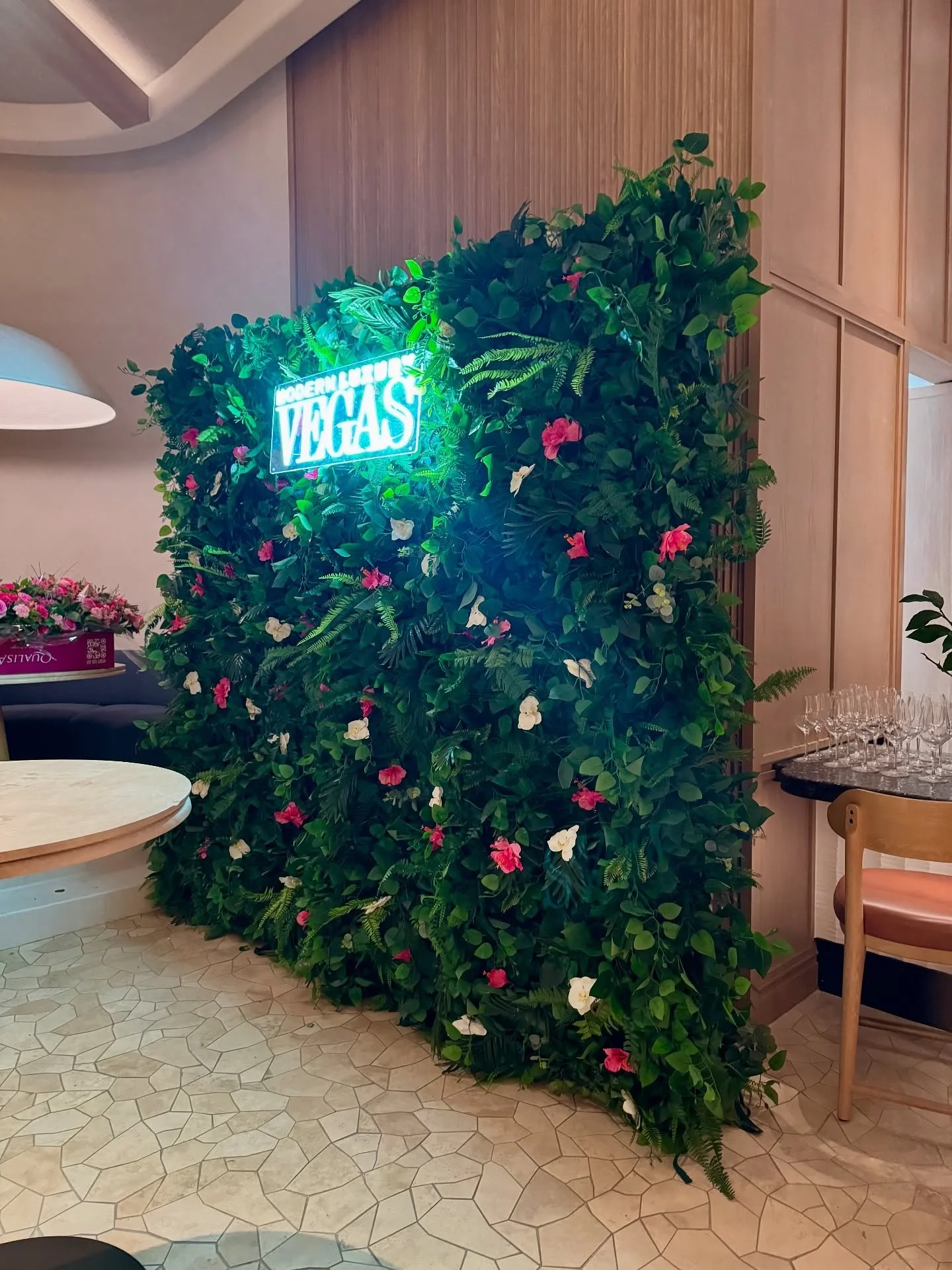 Thank you @modernluxury for your continued support!! 🙏💗 Our Hibiscus Paradise green wall made the perfect backdrop for our client’s Swim & Wellness Event. A fun and fabulous flower wall! This tropical flower wall has pink hibiscus flowers