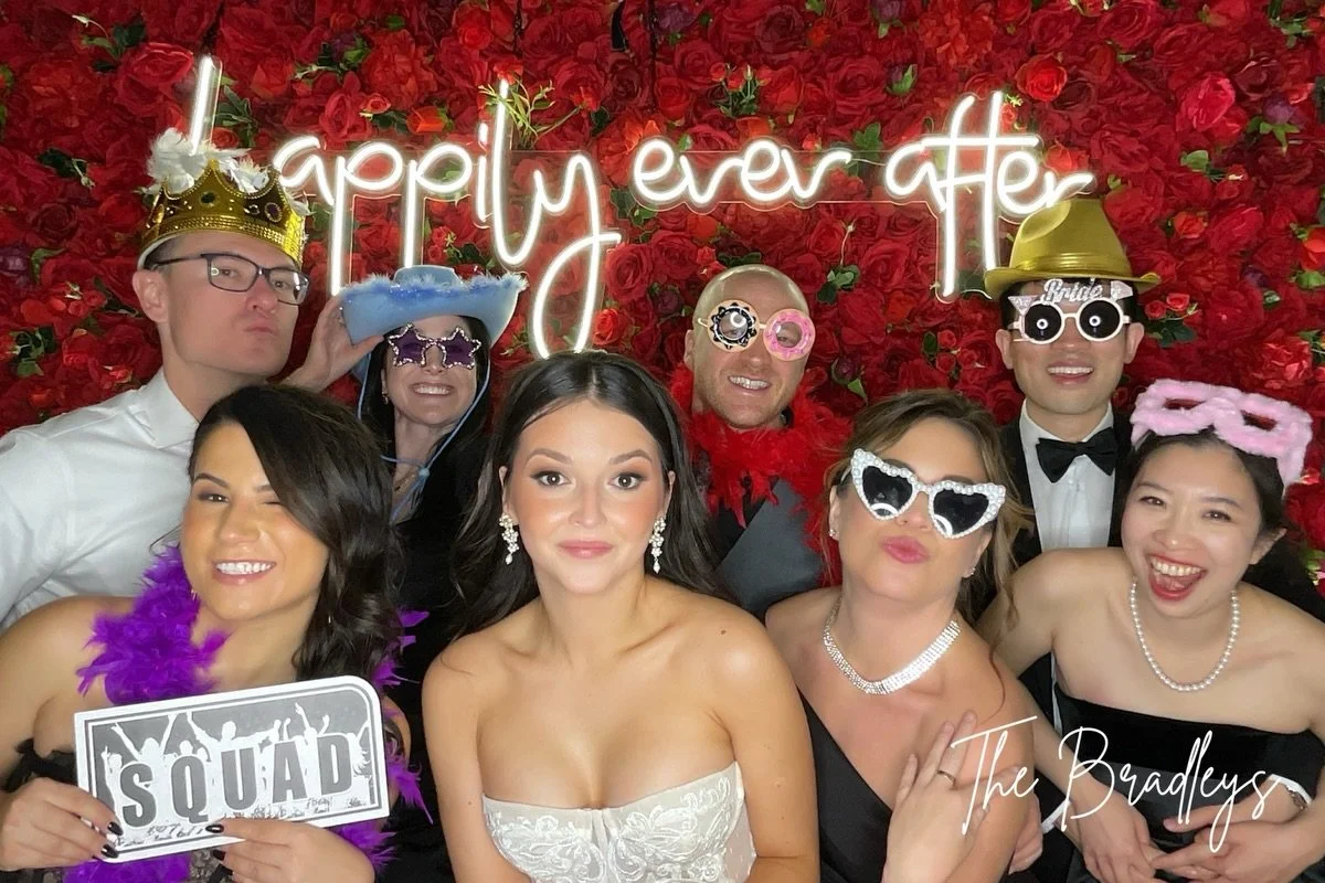 Choose between flower wall, green wall, shimmer wall, wooden, custom printed, plain white, or AI backdrops for your photo booth pictures. Complimentary Social Media Station allows you to instantly share your photos, GIF&rsquo;s and videos via SMS, em