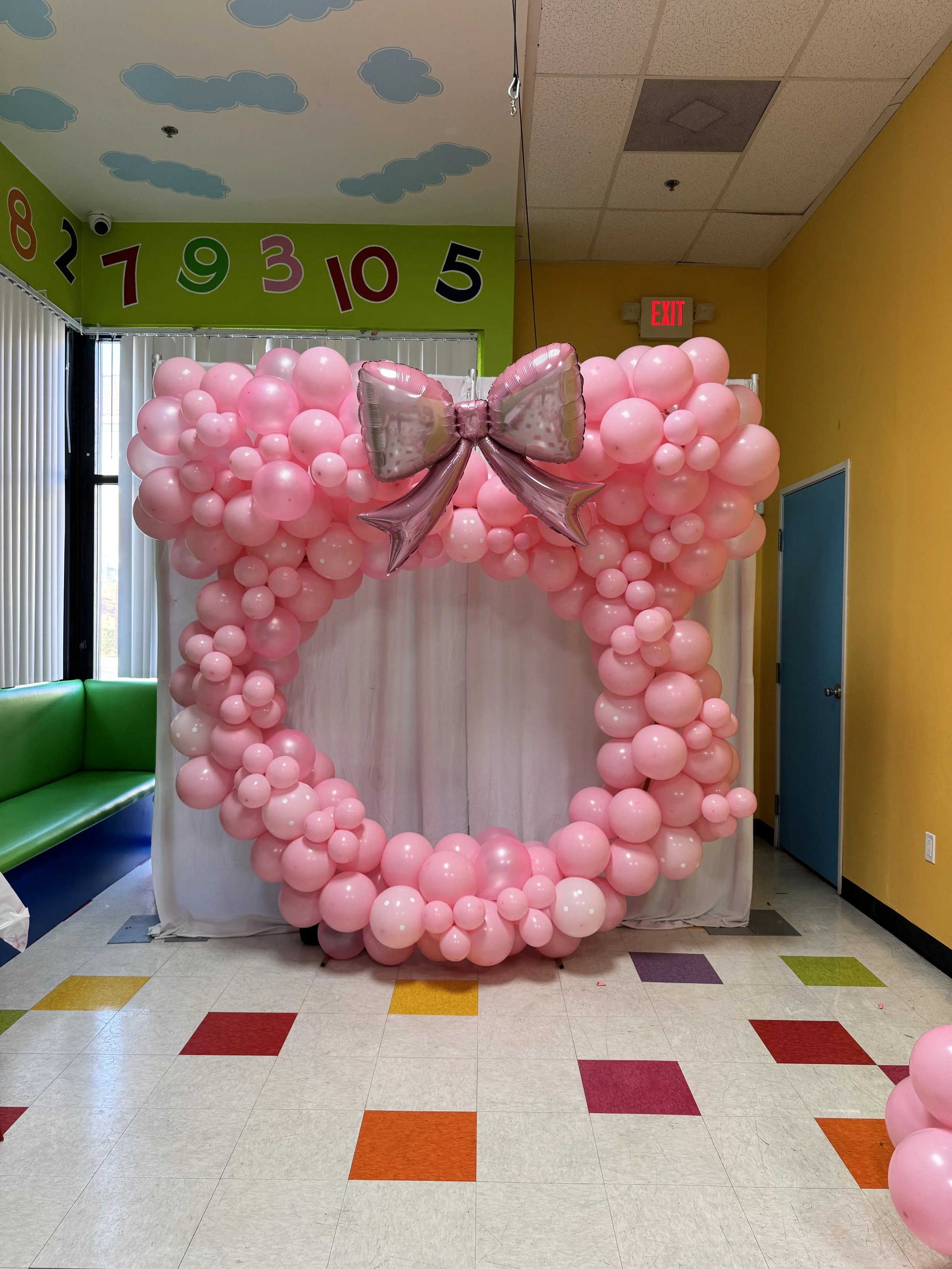 Minnie Mouse balloon hoop flower walls Las Vegas balloon decor Las Vegas