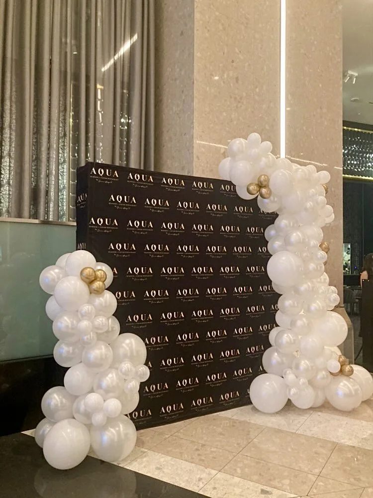 step and repeat with balloon garland balloon decor Las Vegas FLOWER WALLS LAS VEGAS