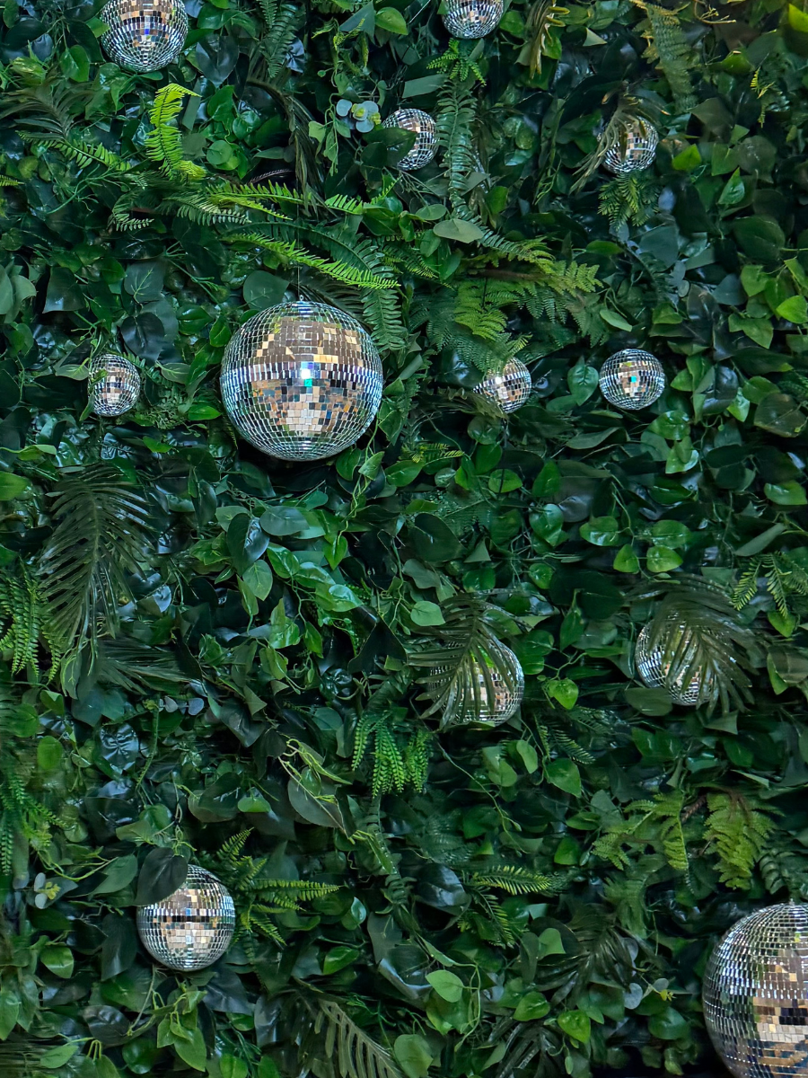 disco ball backdrop disco ball green wall party rentals Las Vegas flower walls Las Vegas