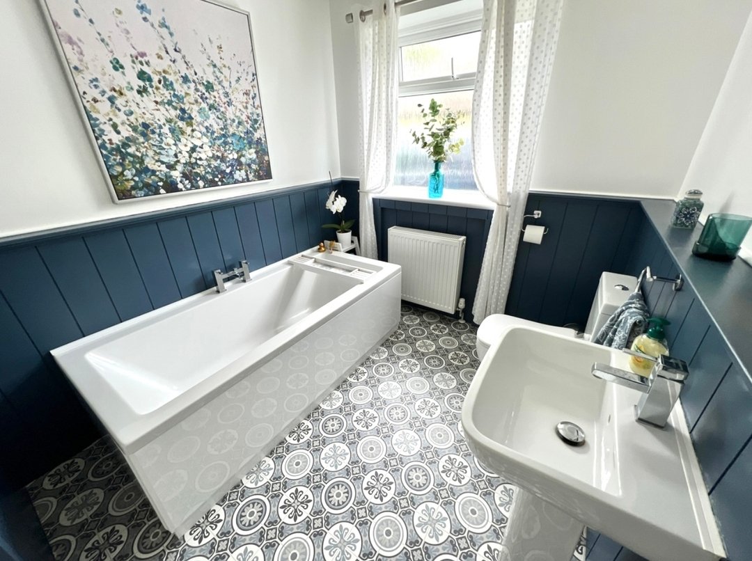 Navy blue is a very on-trend statement colour as shown in this bathroom at one of our previously let properties in Heybridge. 
-
You don't even need to paint, you could use towels, curtains and soft furnishings to add a pop of colour to your space.