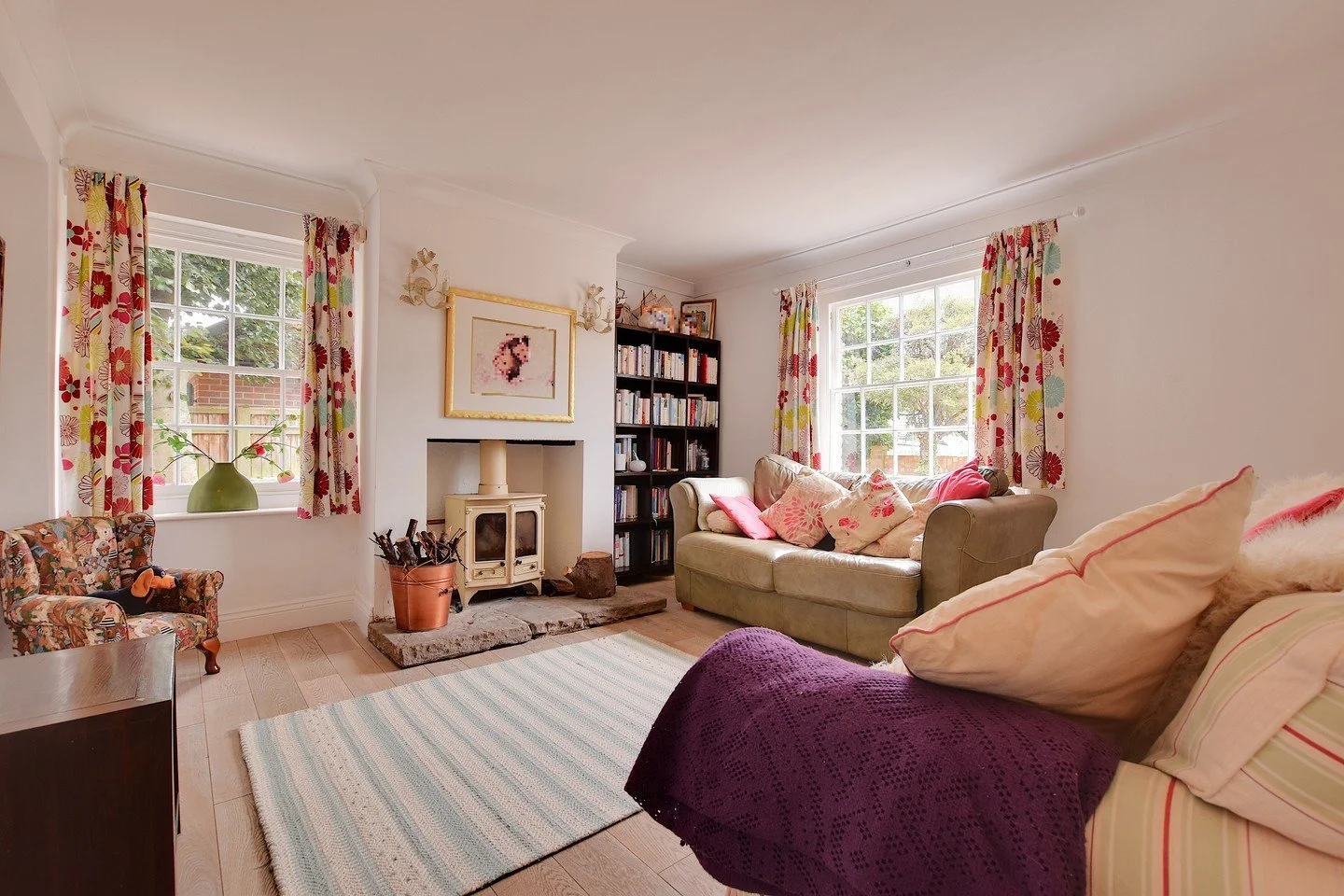 Soft furnishings and a pop of colour just bring this room to life! How inviting is this living room in a previously let property.