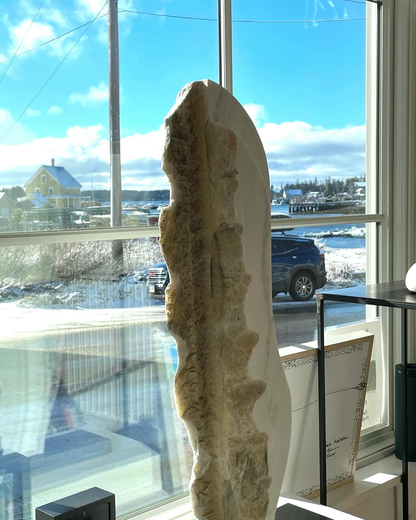 Carl Swidorski&rsquo;s marble sculpture &ldquo;January&rdquo; is looking especially beautiful on this blue sky snowy day. #islandartists #vinalhavenmaine #wintersky #maineartgallery