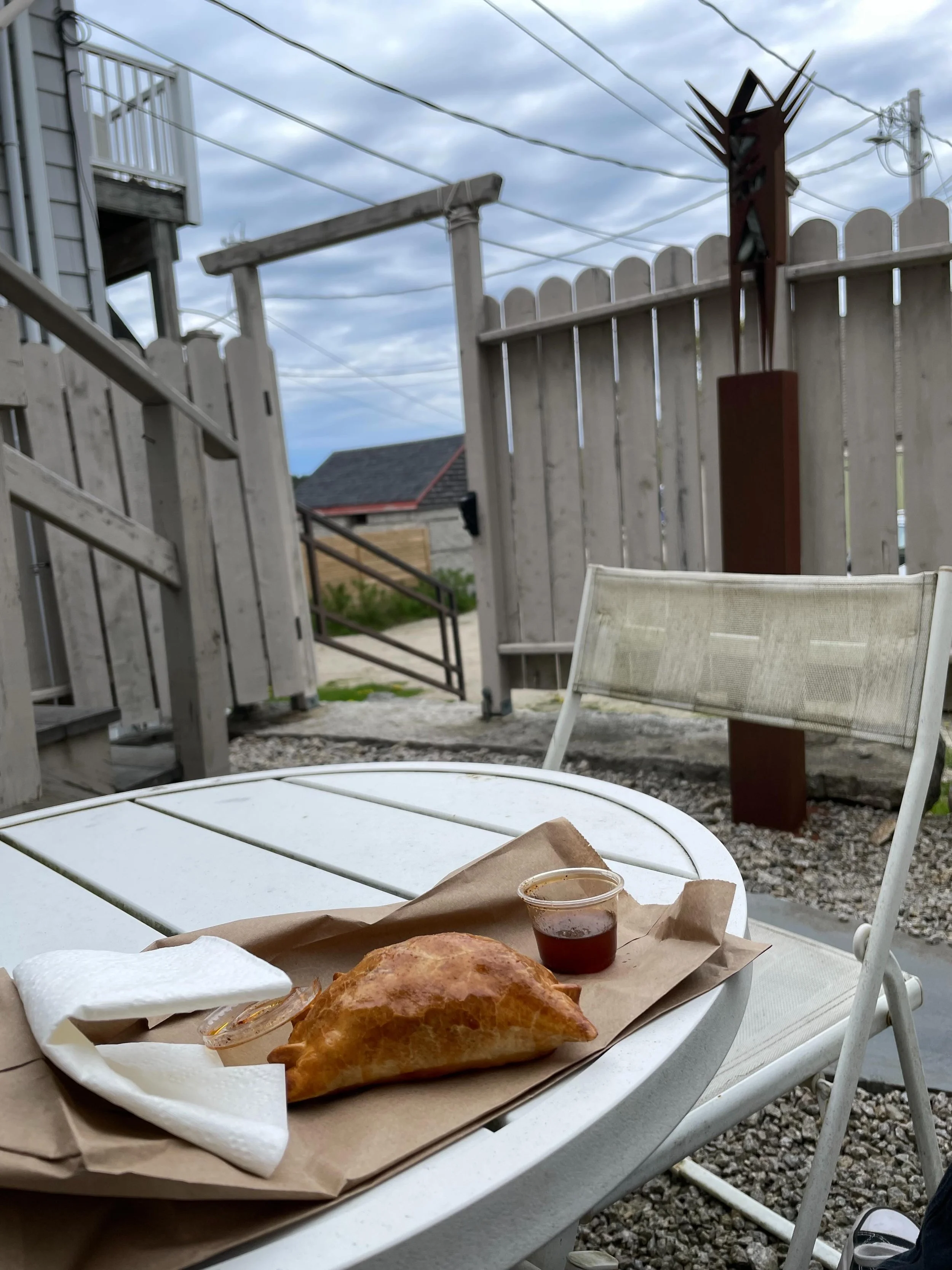 Taking a little lunch break @theislandwavevh in the newly arranged sculpture garden at New Era. Opening for the 2026 season this Saturday!! #vinalhaven #islandlife #islandartists #galleryopening #summer2026