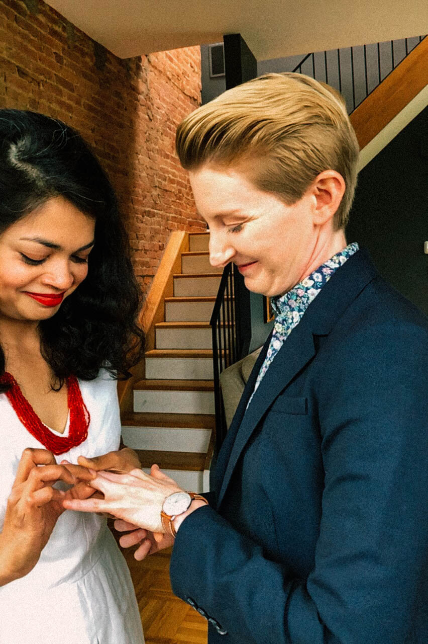 LGBTQ couple exchanging wedding rings in Washington DC Shawnee Custalow Queer Wedding Photographer