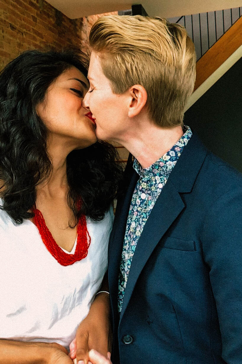 Newlywed LGBTQ couple kissing in DC Shawnee Custalow Queer Wedding Photographer