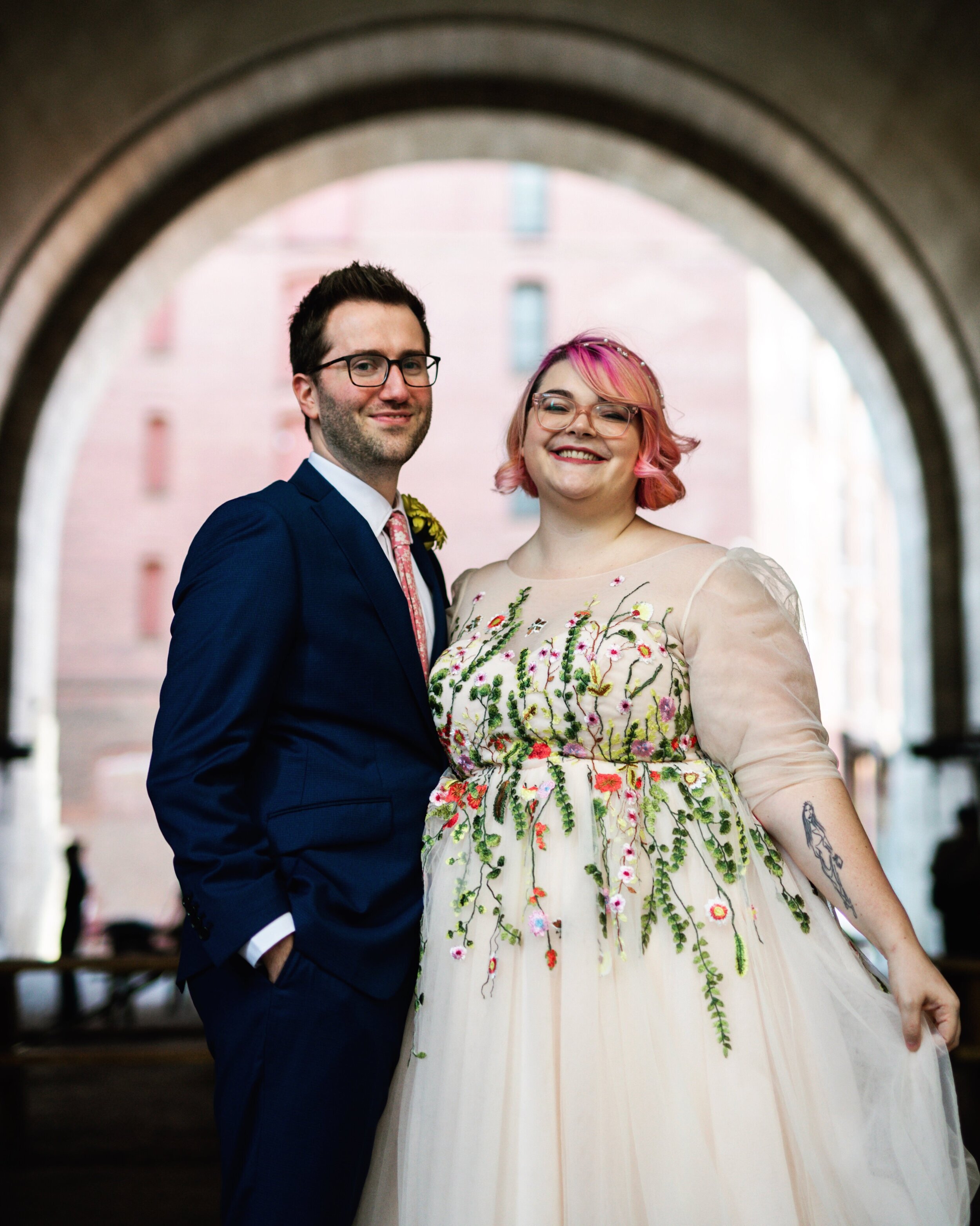 Groom and bride with a floral wedding dress in Richmond VA Shawnee Custalow Queer Wedding Photography