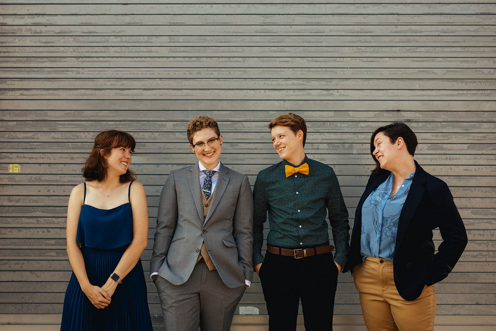Queer future spouse posing with their wedding party in Brooklyn NYC Shawnee Custalow Queer Wedding Photographer