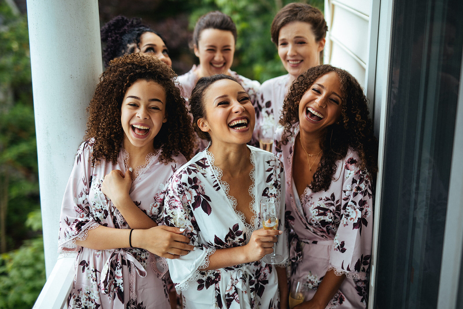 Bride and bridesmaids with matching robes in Annapolis MD Shawnee Custalow photography